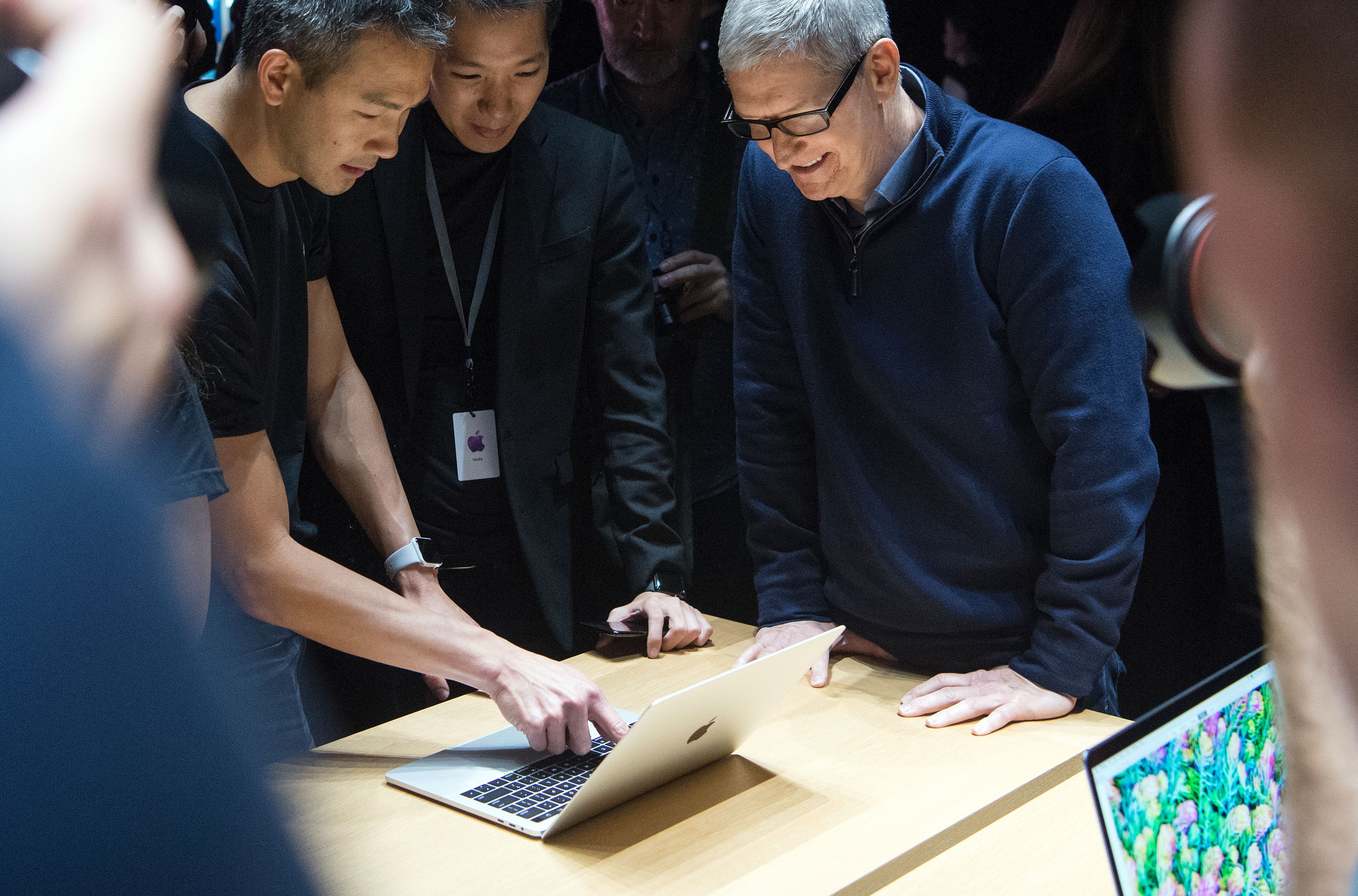 Apple CEO Tim Cook previews a MacBook Pro during a product launch event at Apple headquarters in Cupertino, Calif. on Oct. 27, 2016. (Josh Edelson—AFP/Getty Images)