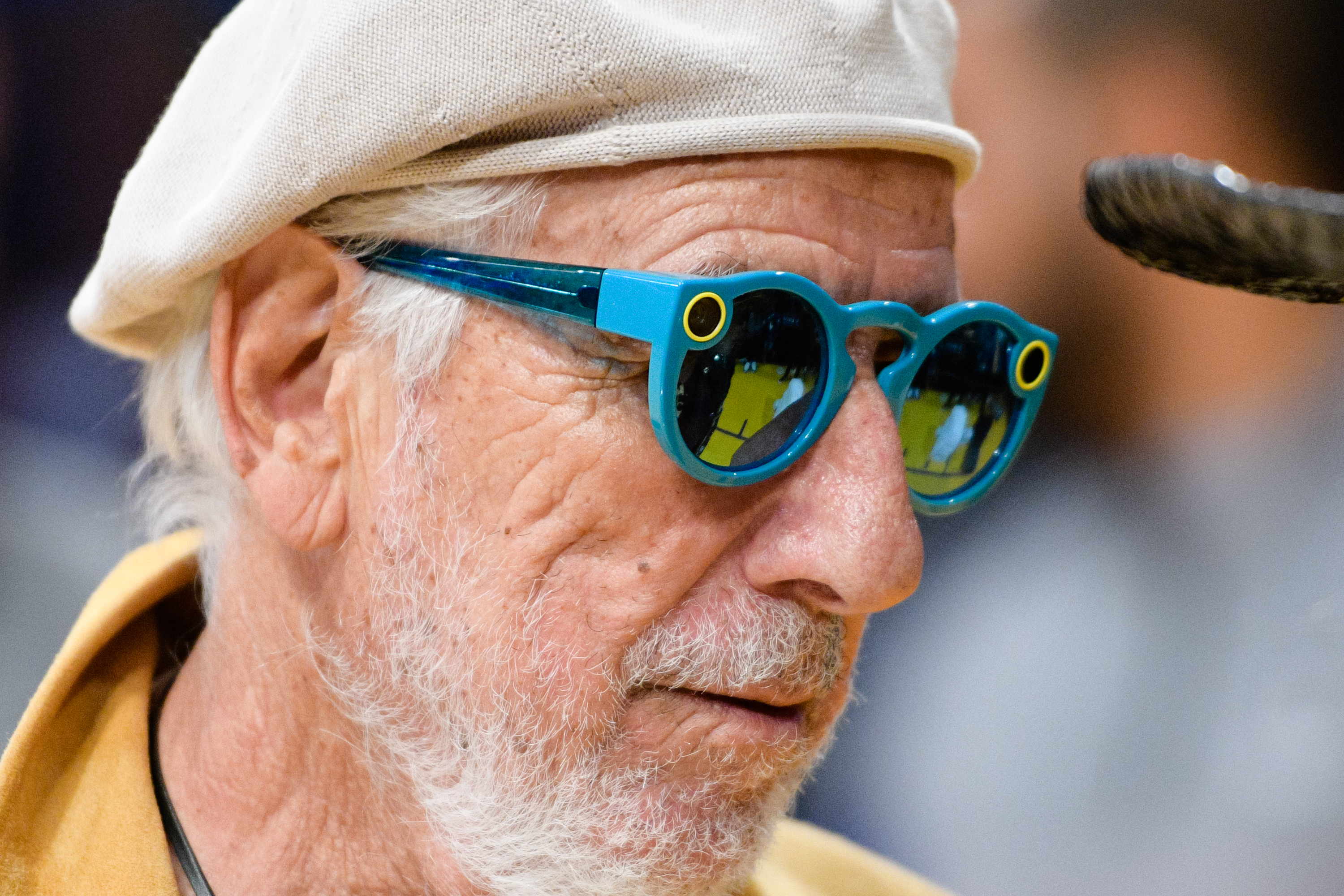 Lou Adler, wearing Snapchat's Spectacles, attends a basketball game between the Brooklyn Nets and the Los Angeles Lakers at Staples Center on November 15, 2016 in Los Angeles, California. (Noel Vasquez&mdash;Getty Images,)
