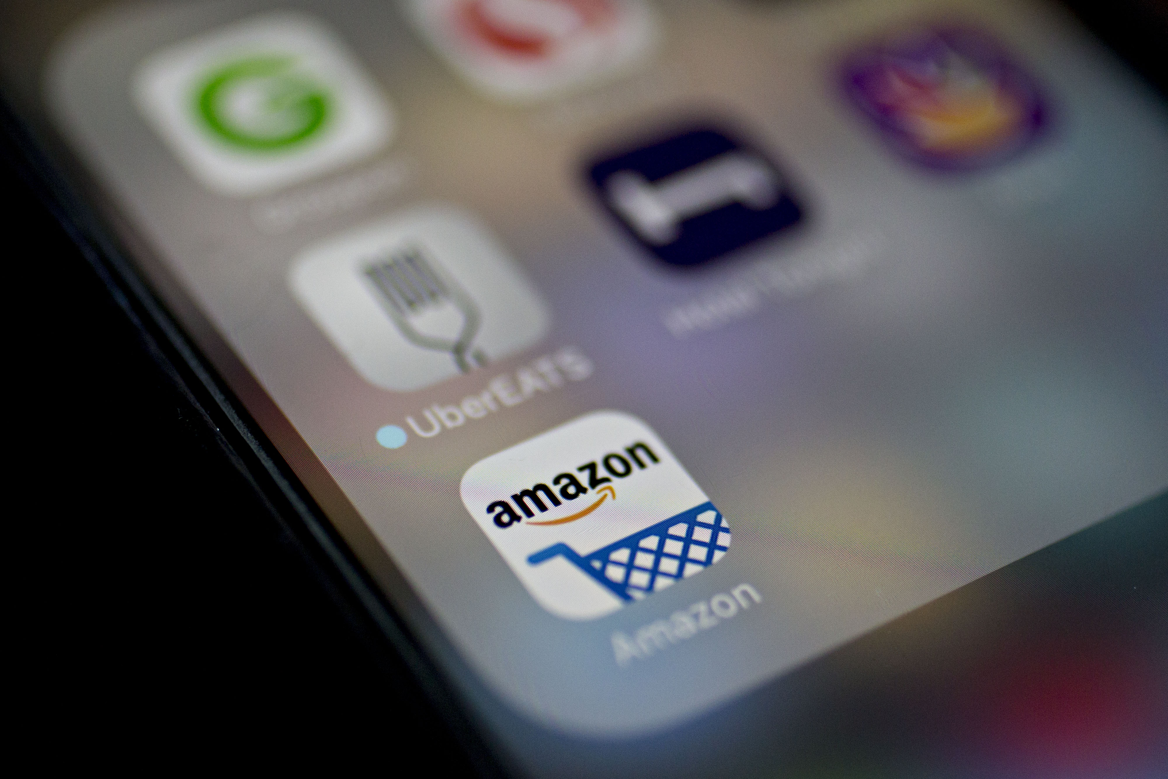 The Amazon.com Inc. application icon is displayed on an Apple Inc. iPhone in Washington, D.C., U.S., on Monday, Dec. 5, 2016. (Bloomberg&mdash;Bloomberg via Getty Images)