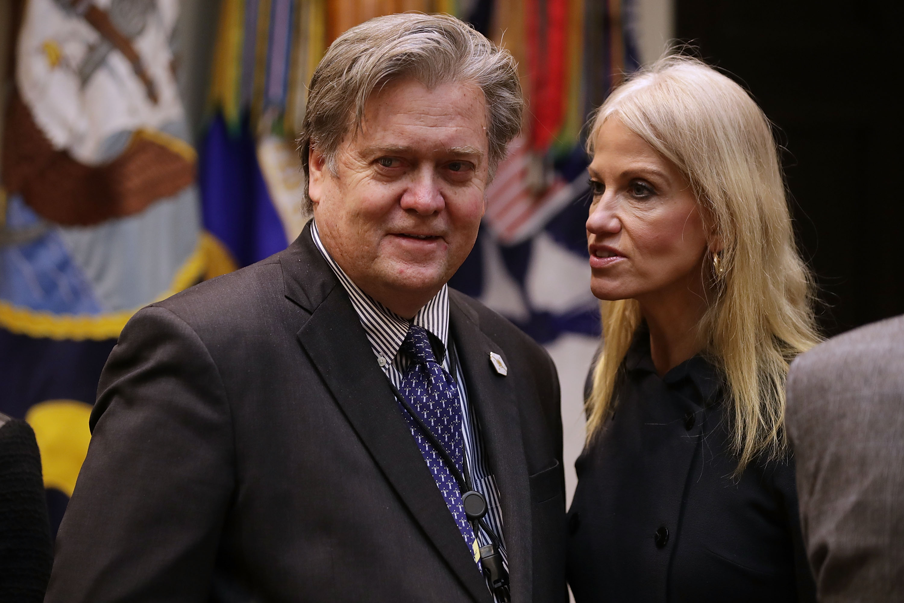 White House Chief Strategist Steve Bannon (L) and Counselor to the President Kellyanne Conway wait for the arrival of U.S. President Donald Trump for a meeting on cyber security in the Roosevelt Room at the White House January 31, 2017 in Washington, DC. (Chip Somodevilla—Getty Images)