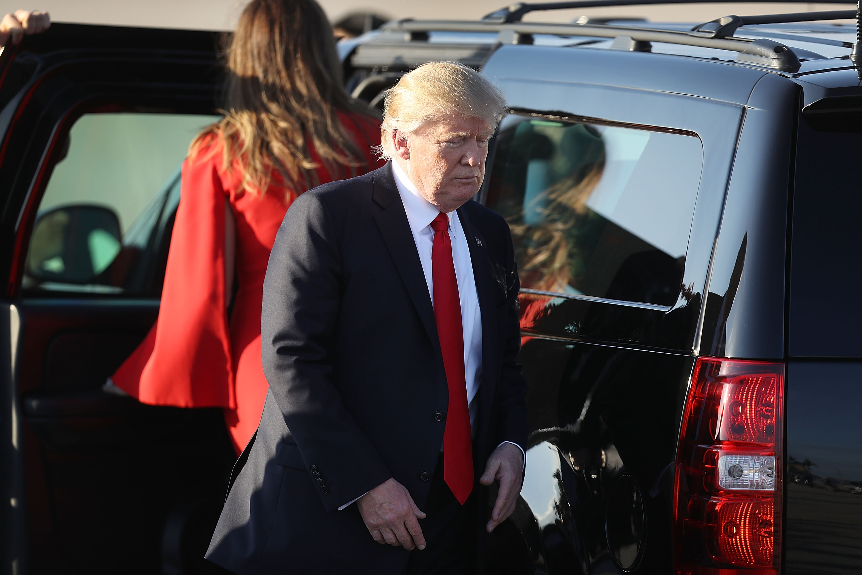 U.S. President Donald Trump walks to his vehicle after arriving on Air Force One at the Palm Beach International Airport for a visit to his Mar-a-Lago Resort for the weekend on February 3, 2017 in Palm Beach, Florida.  Joe Raedle—Getty Images (Joe Raedle—Getty Images)