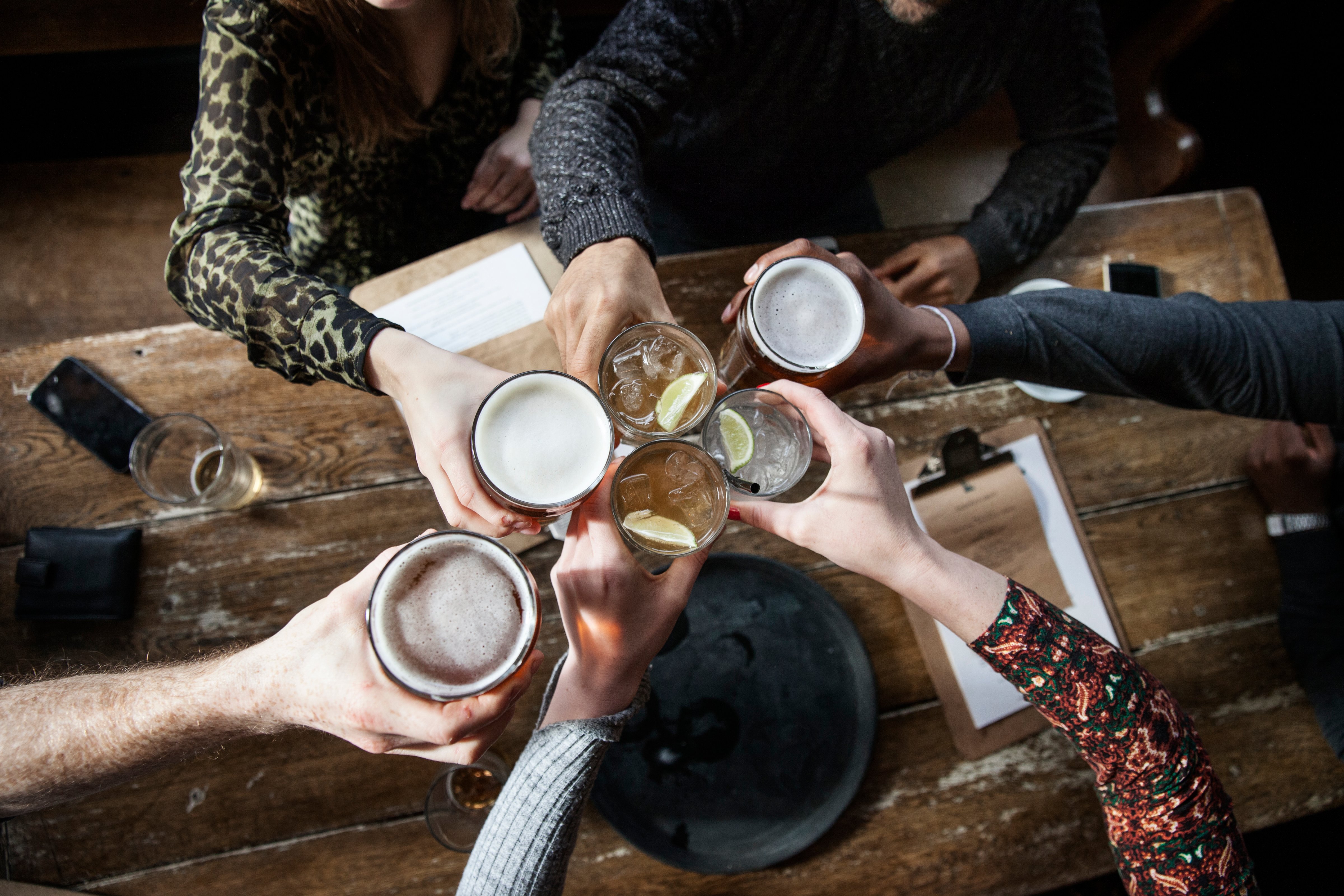 Stock photo of friends toasting at a pub (Henrik Sorensen—Getty Images)
