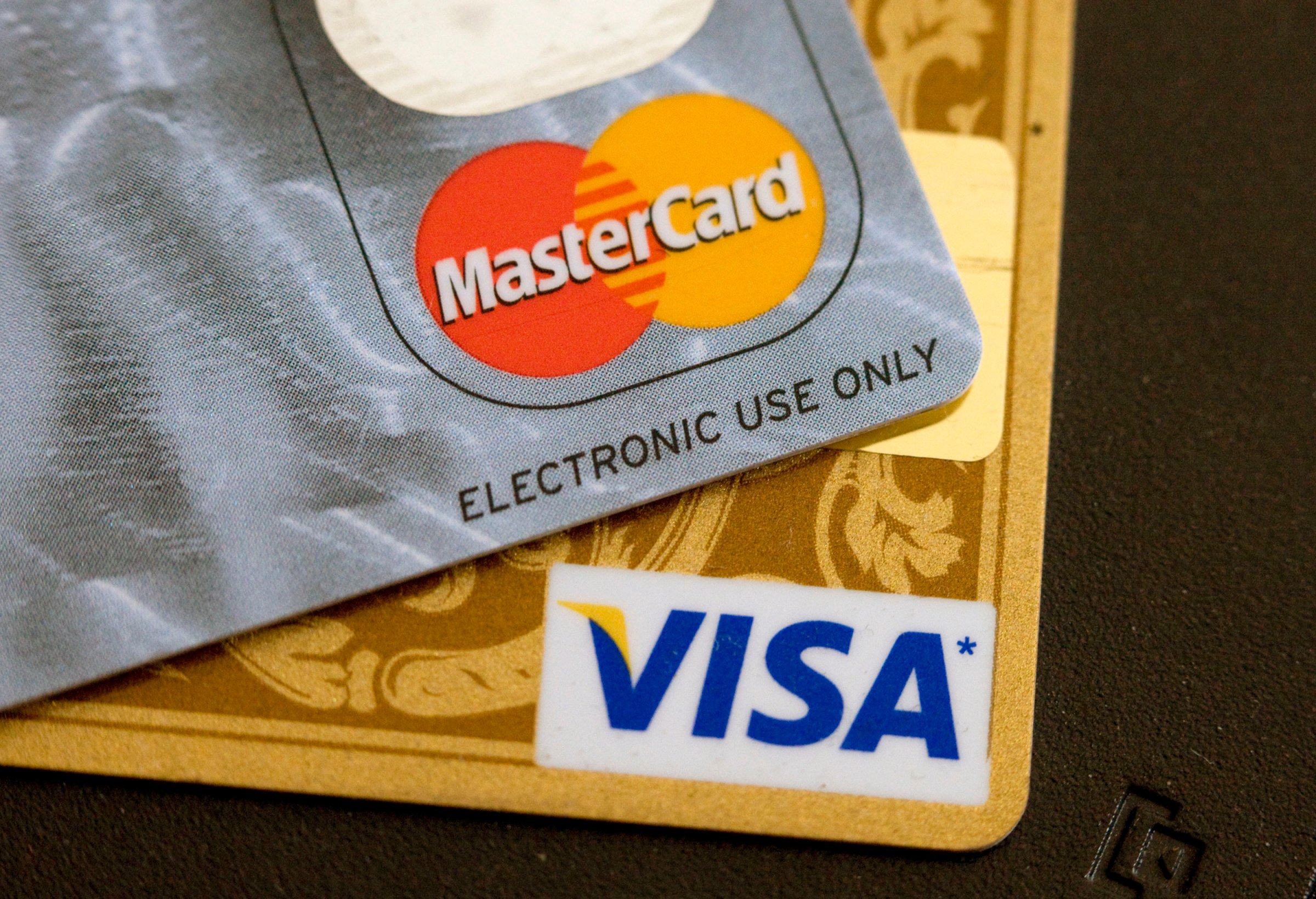 Visa and MasterCard credit cards are arranged for a photo in