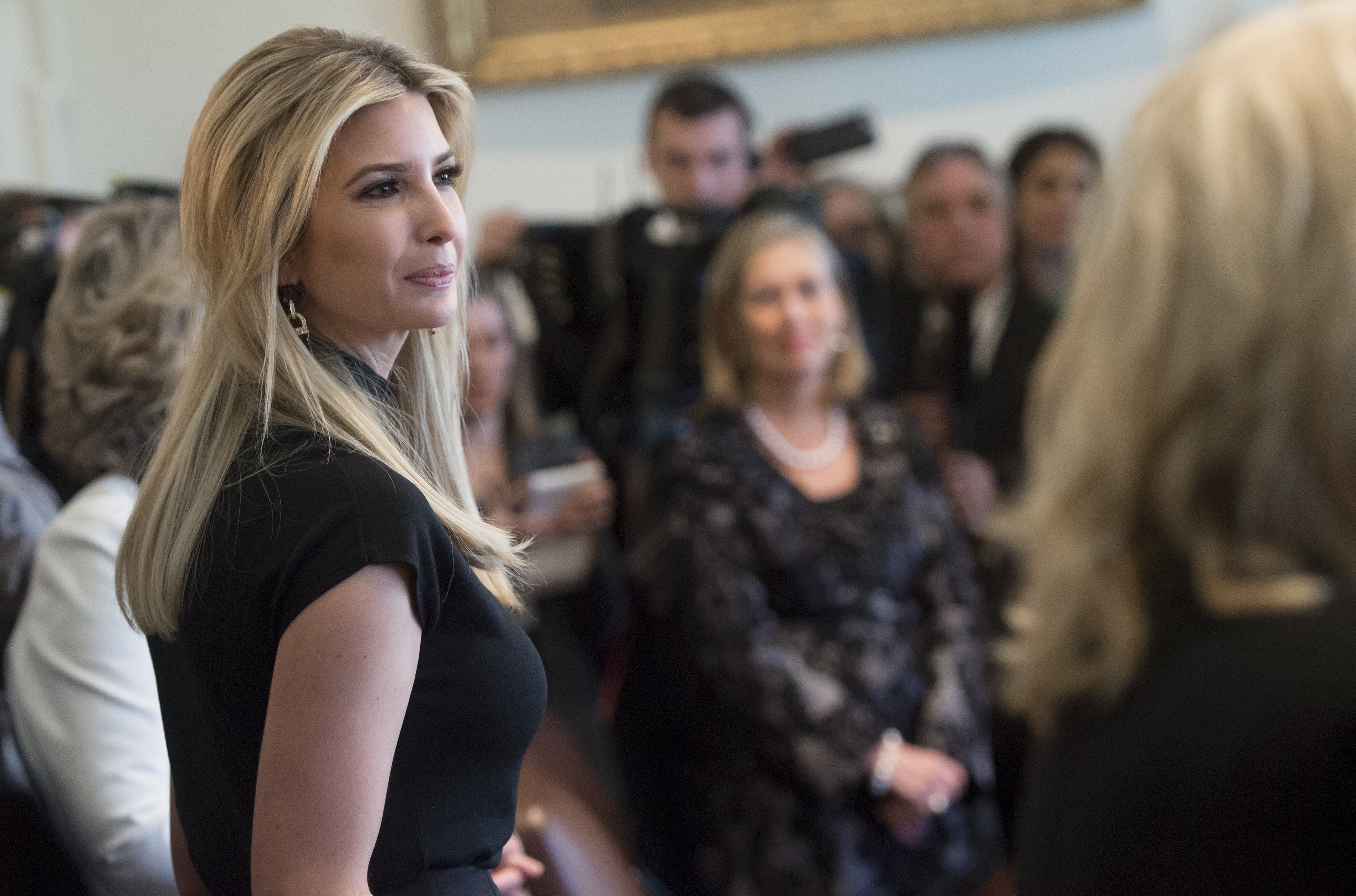 Ivanka Trump, daughter of US President Donald Trump, attends a roundtable discussion with Canadian Prime Minister Justin Trudeau on women entrepreneurs and business leaders in the Cabinet Room of the White House in Washington, DC, Feb. 13, 2017. (Saul Loeb—AFP/Getty Images)