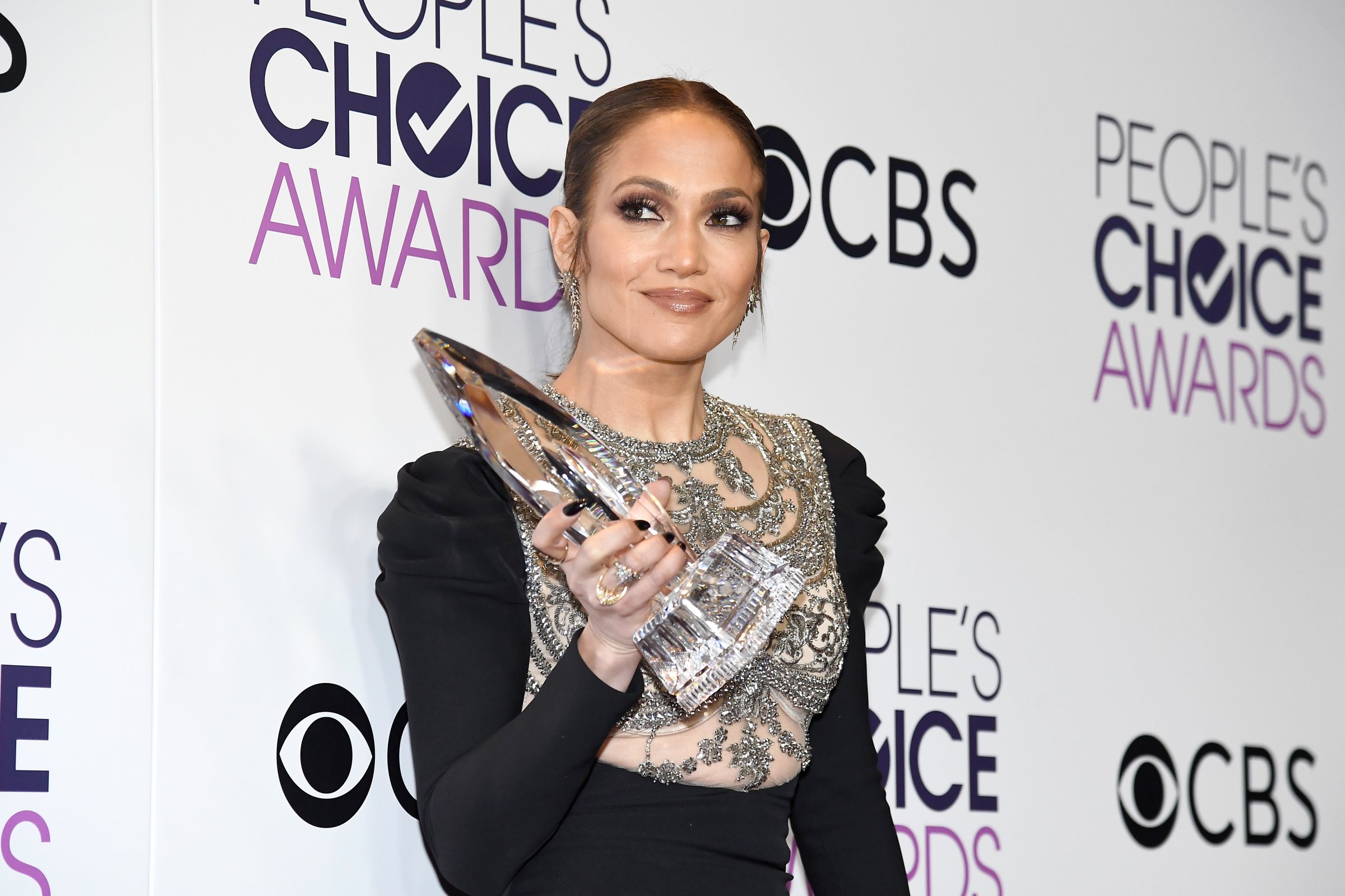 Actress/recording artist Jennifer Lopez, winner of Favorite TV Crime Drama Actress award for "Shades of Blue" poses in the press room at the People's Choice Awards 2017 at Microsoft Theater on January 18, 2017 in Los Angeles, California.