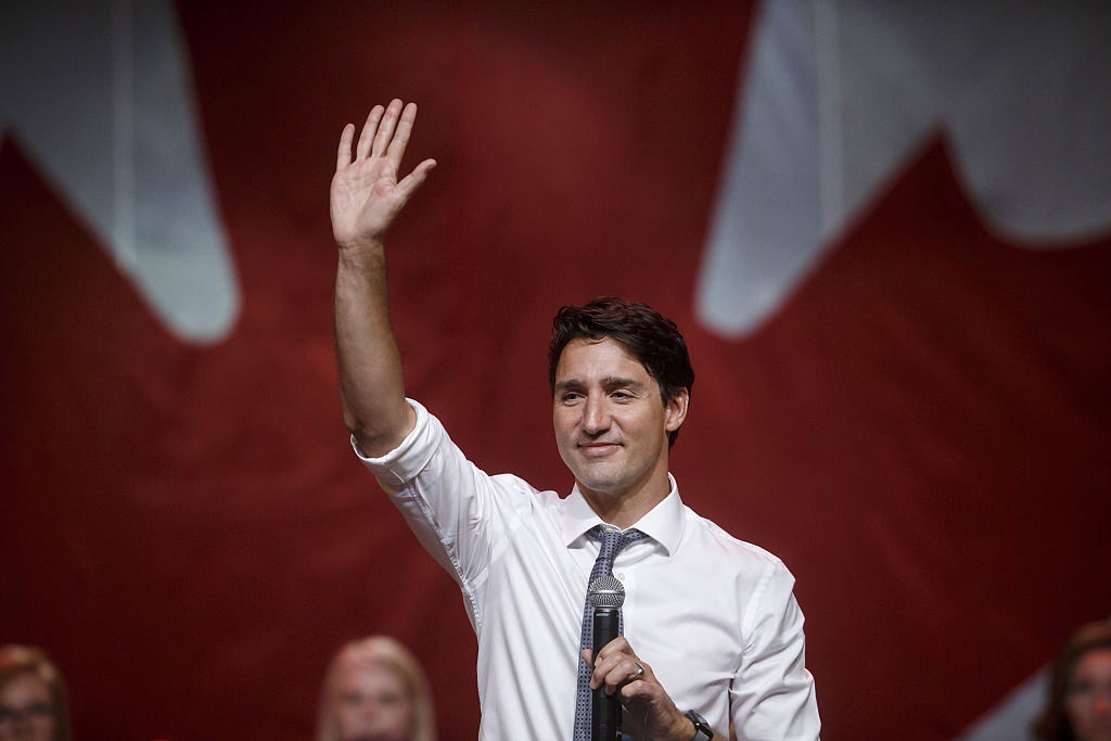 Justin Trudeau, Canada's prime minister, waves during the end of a town hall event in Bellevile, Ontario, Canada, on Thursday, Jan. 12, 2017. (Cole Burston—Bloomberg via Getty Images)