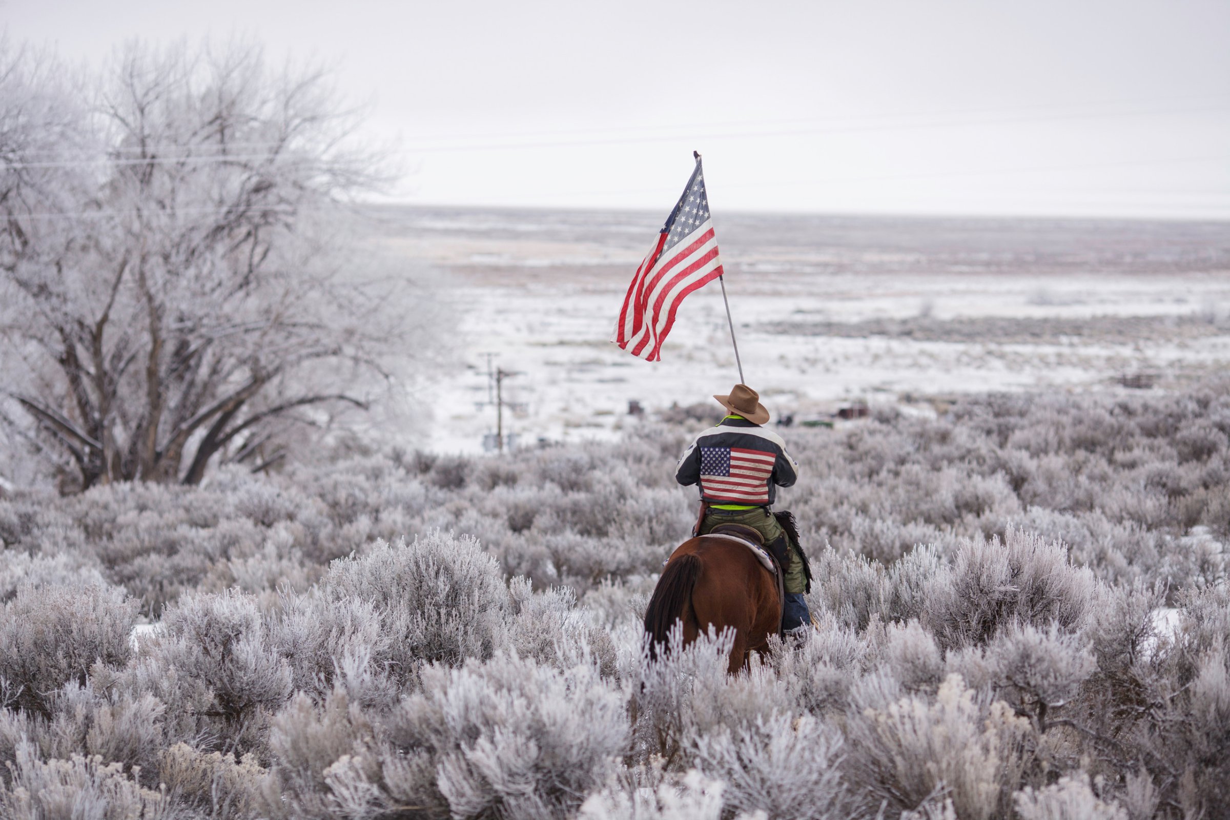 TOPSHOT - Duane Ehmer rides his horse Hellboy at the occupied Malheur National Wildlife Refuge on the sixth day of the occupation of the federal building in Burns, Oregon on January 7, 2016. The leader of a small group of armed activists who have occupied a remote wildlife refuge in Oregon hinted on Wednesday that the standoff may be nearing its end. / AFP / ROB KERR (Photo credit should read ROB KERR/AFP/Getty Images)