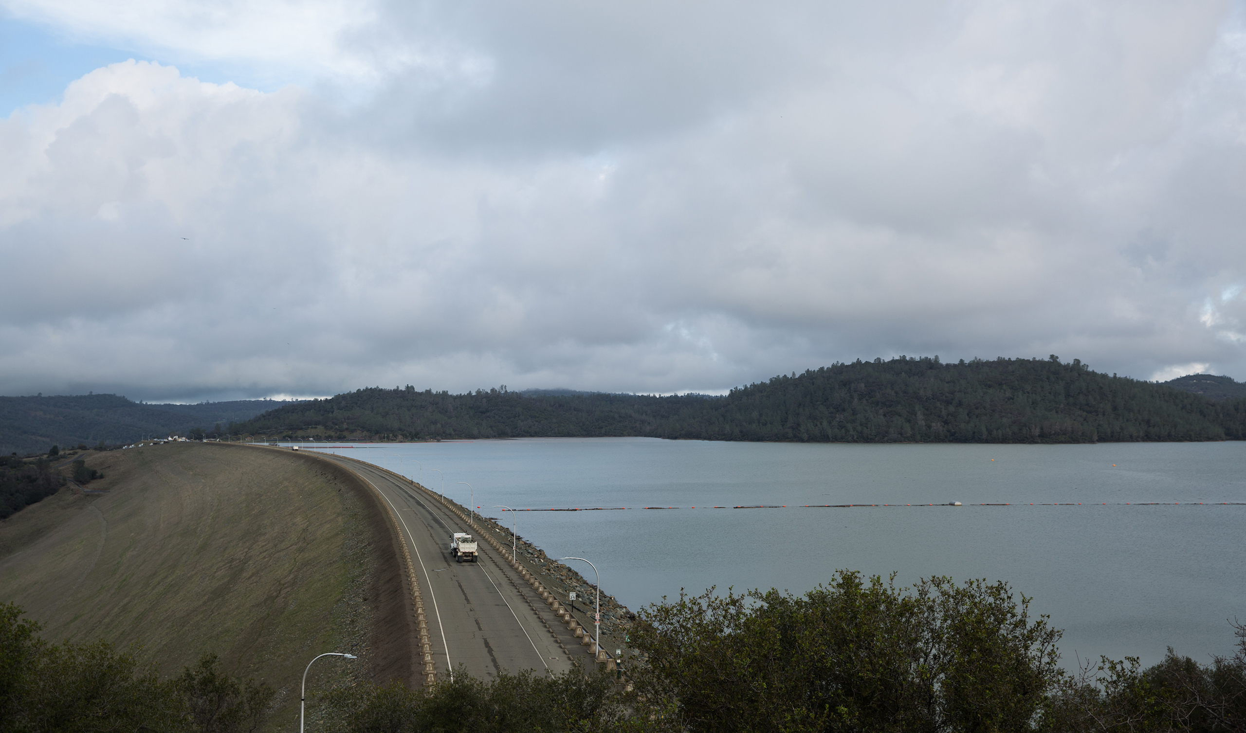 The Oroville reservoir level sits very close to the top of Oroville Dam in Oroville, Calif., on Feb. 10, 2017.