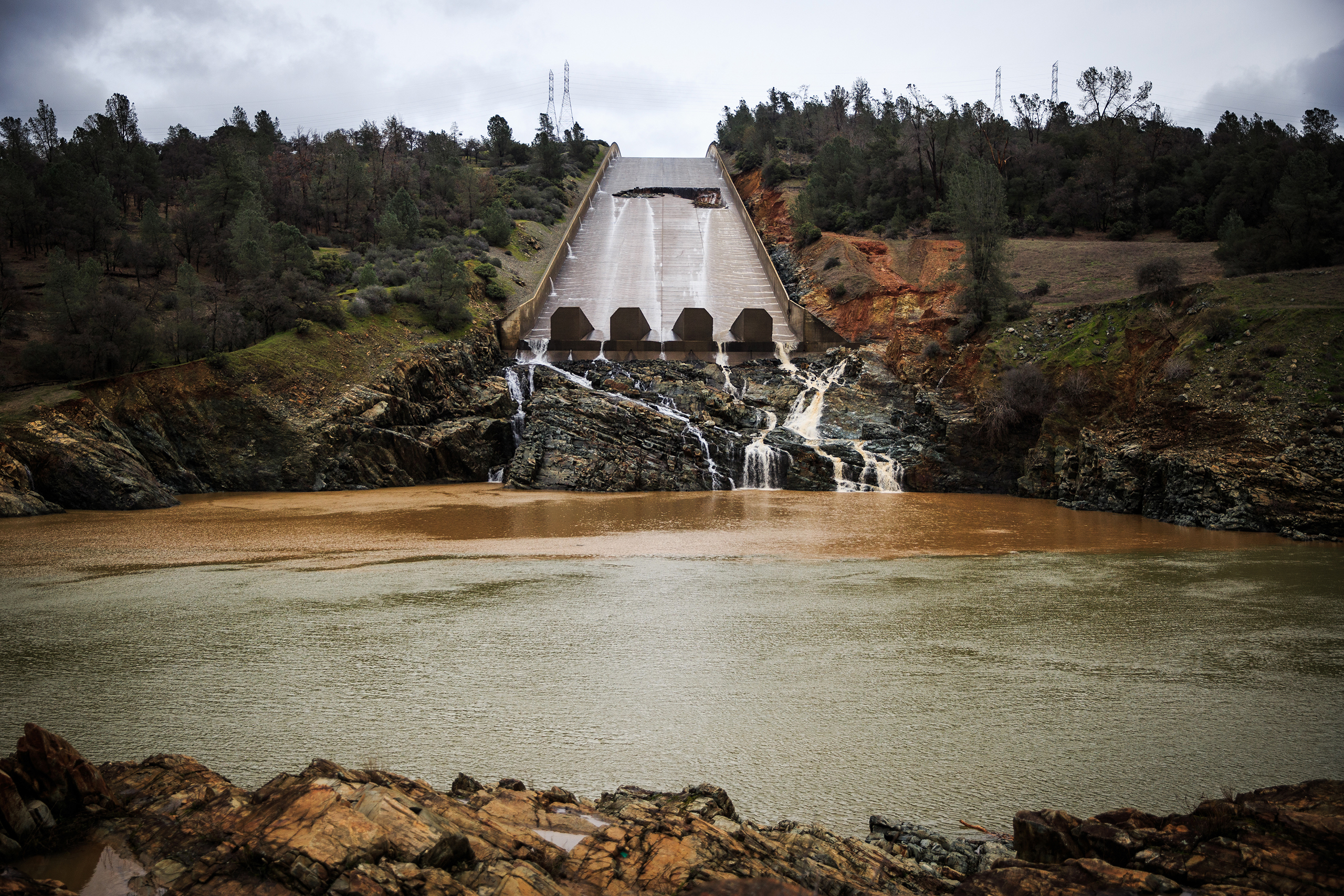A hole was torn in the spillway of the Oroville Dam while releasing approximately 60,000 cubic-feet-second of water in advance of more rain in Oroville, Calif., on Feb. 7, 2017.