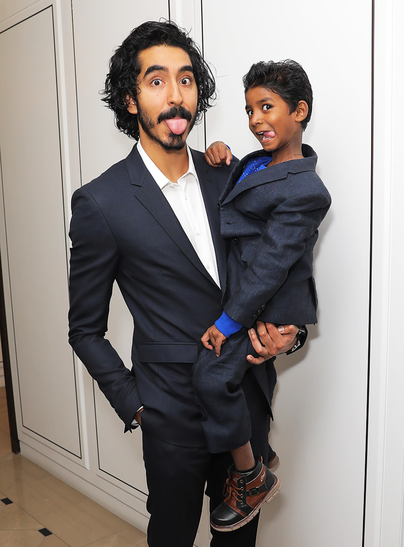 Dev Patel and Sunny Pawar at  Burberry and The Weinstein Company honor Dev Patel,  in Los Angeles, on Nov. 30, 2016.