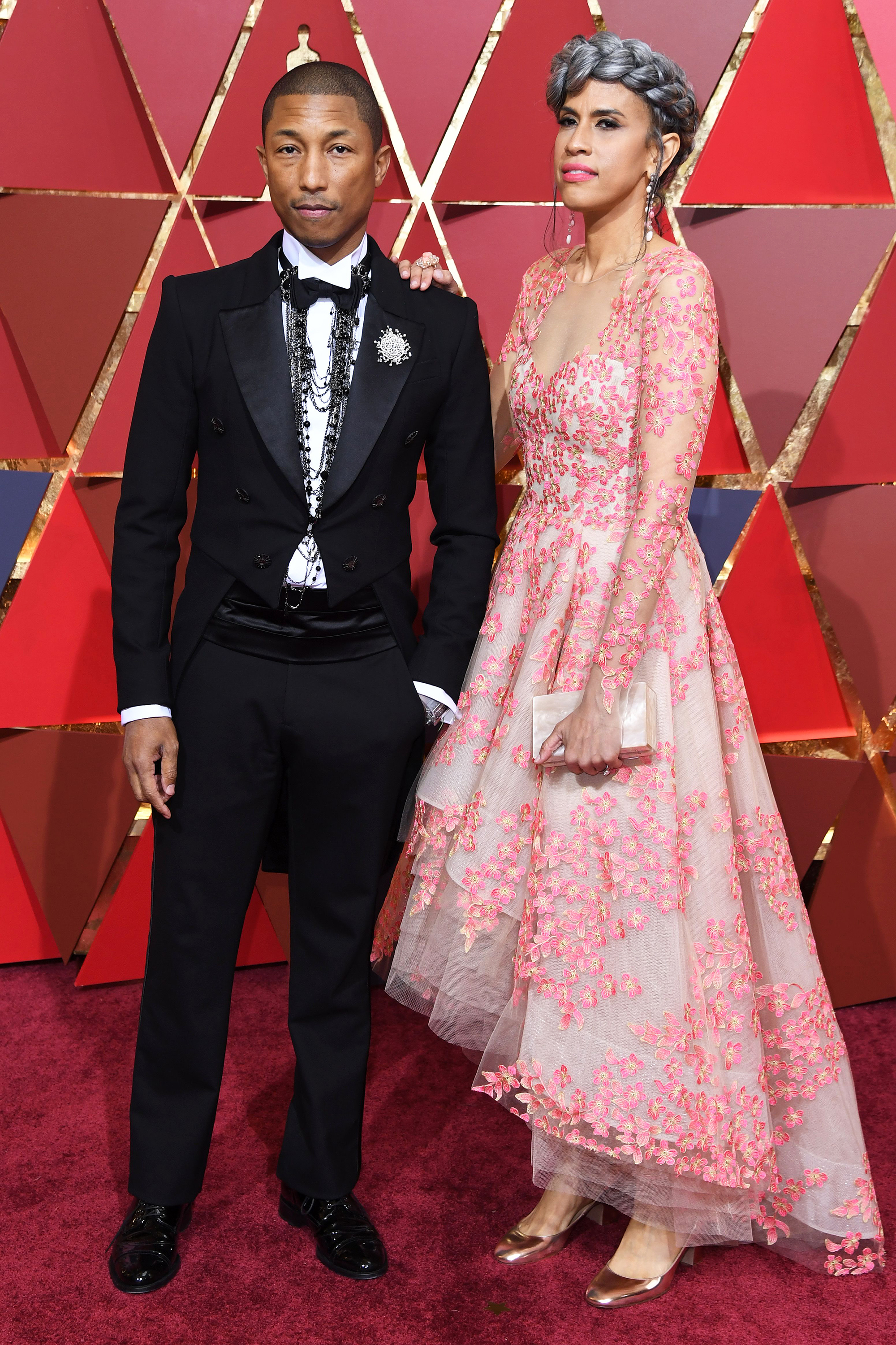 Pharrell Williams and Helen Lasichanh on the red carpet for the 89th Oscars, on Feb. 26, 2017 in Hollywood, Calif.