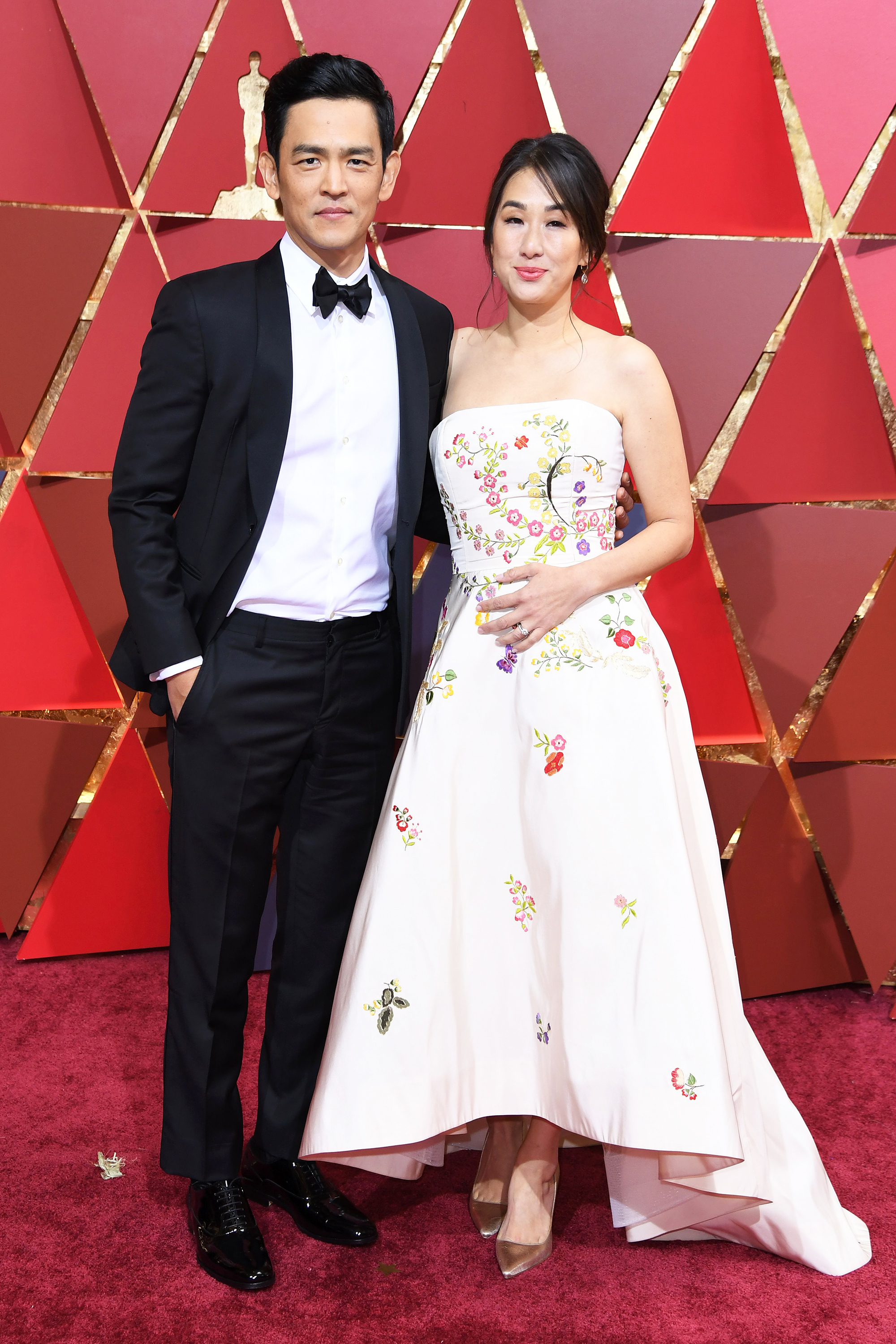 Kerri Higuchi and John Cho on the red carpet for the 89th Oscars, on Feb. 26, 2017 in Hollywood, Calif.