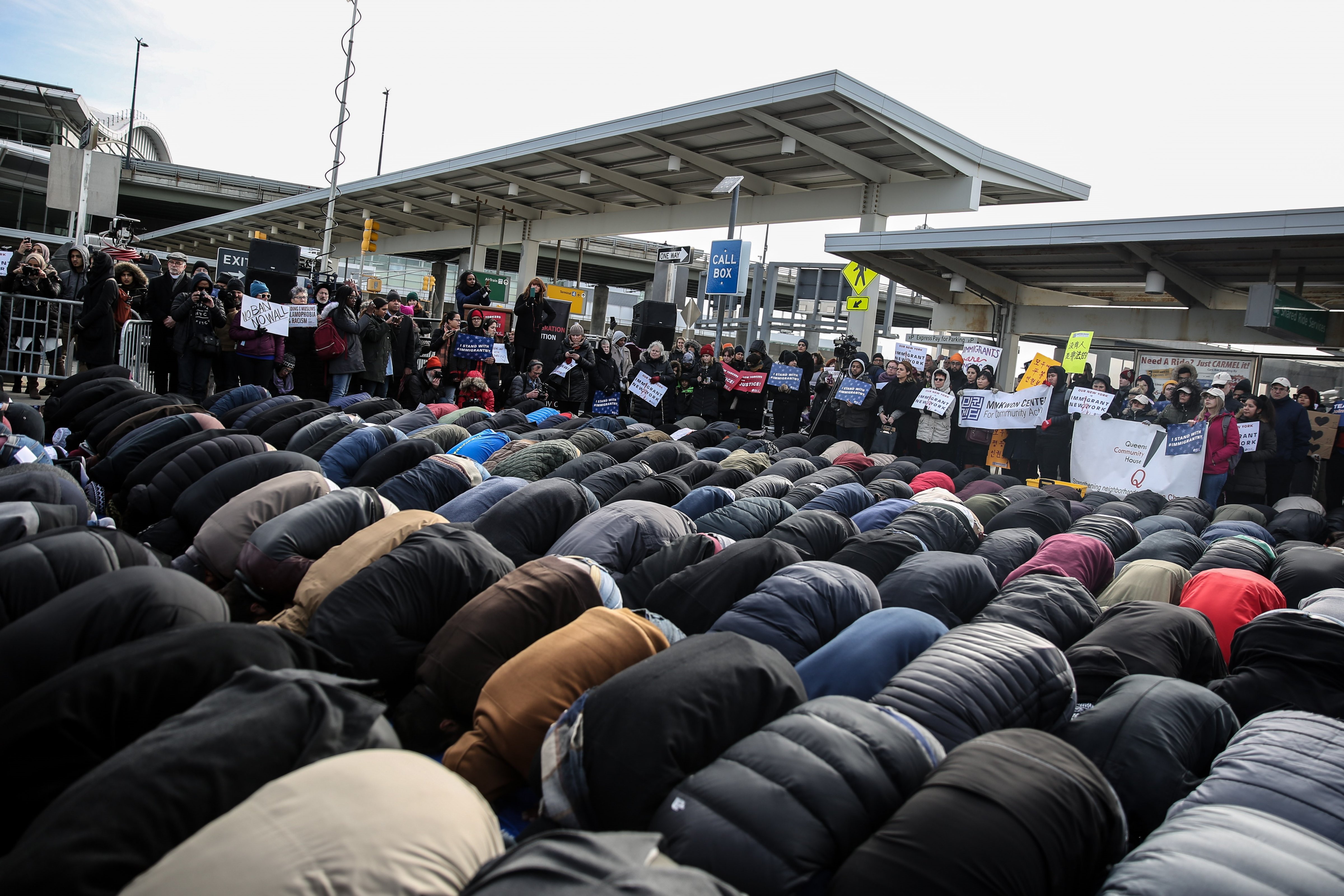 Muslim Americans perform Friday Prayer at JFK Airport as a protest against President Donald J. Trump's executive order banning entry of 7 Muslim-majority countries of admission and visas for 90 days in Queens borough of New York, NY, on Feb. 3, 2017. (Mohammed Elshamy—Anadolu Agency/Getty Images)