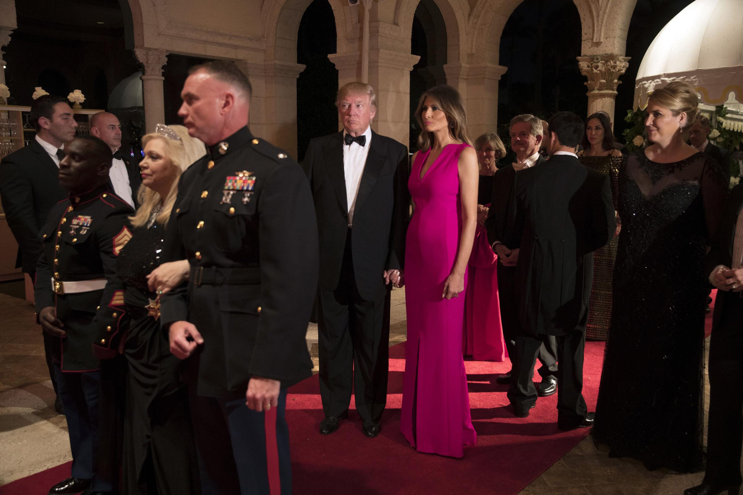 President Donald Trump and first lady Melania Trump arriving at the Red Cross Gala in the ballroom of Mar-a-lago, in Palm Beach, Sunday.