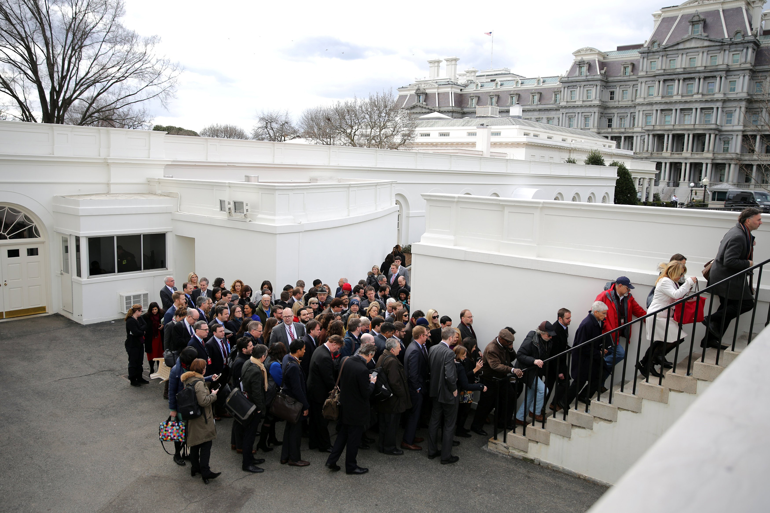 Members of the media line up to attend a news conference between British Prime Minister Theresa May and President Donald Trump at the White House in Washington, on Jan. 27, 2017.