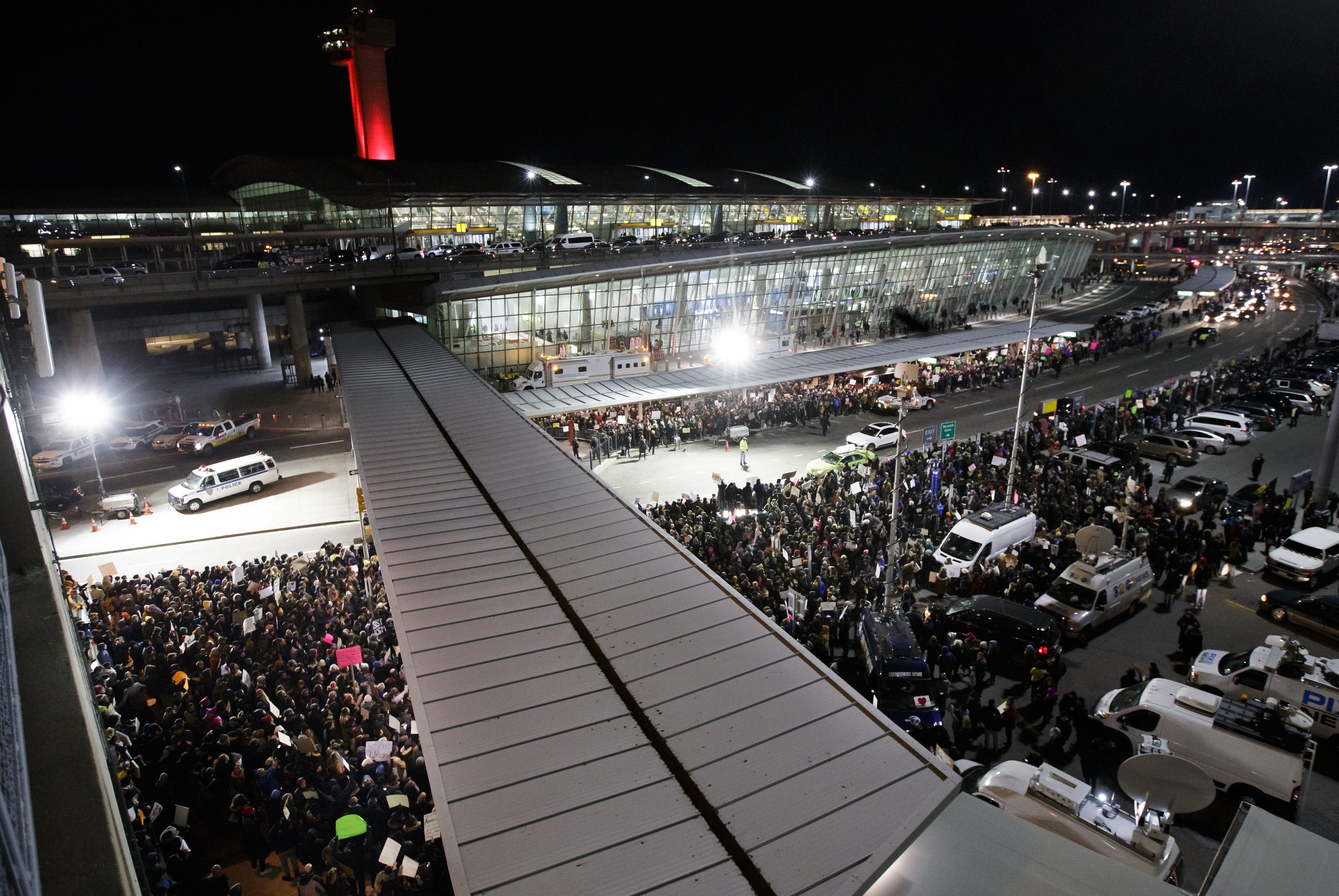 People gather for a protest at Terminal 4 of the John F. Kennedy International Airport after people arriving from Muslim countries were held at the border control as a result of the new immigration policies enacted by US President Donald Trump in New York, on Jan. 28, 2017.