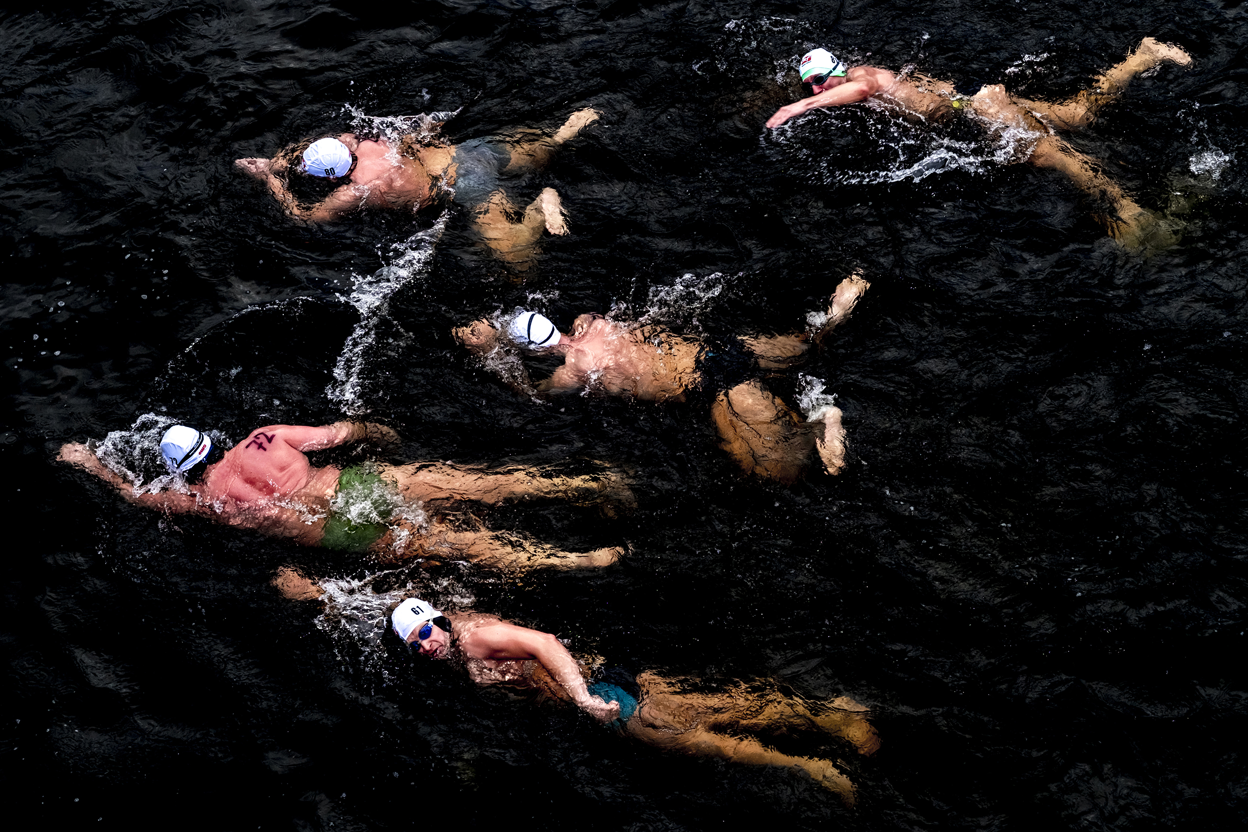 A group of swimmers take part in a Boxing Day swim in the Vltava River in Prague on Dec. 26 2016.