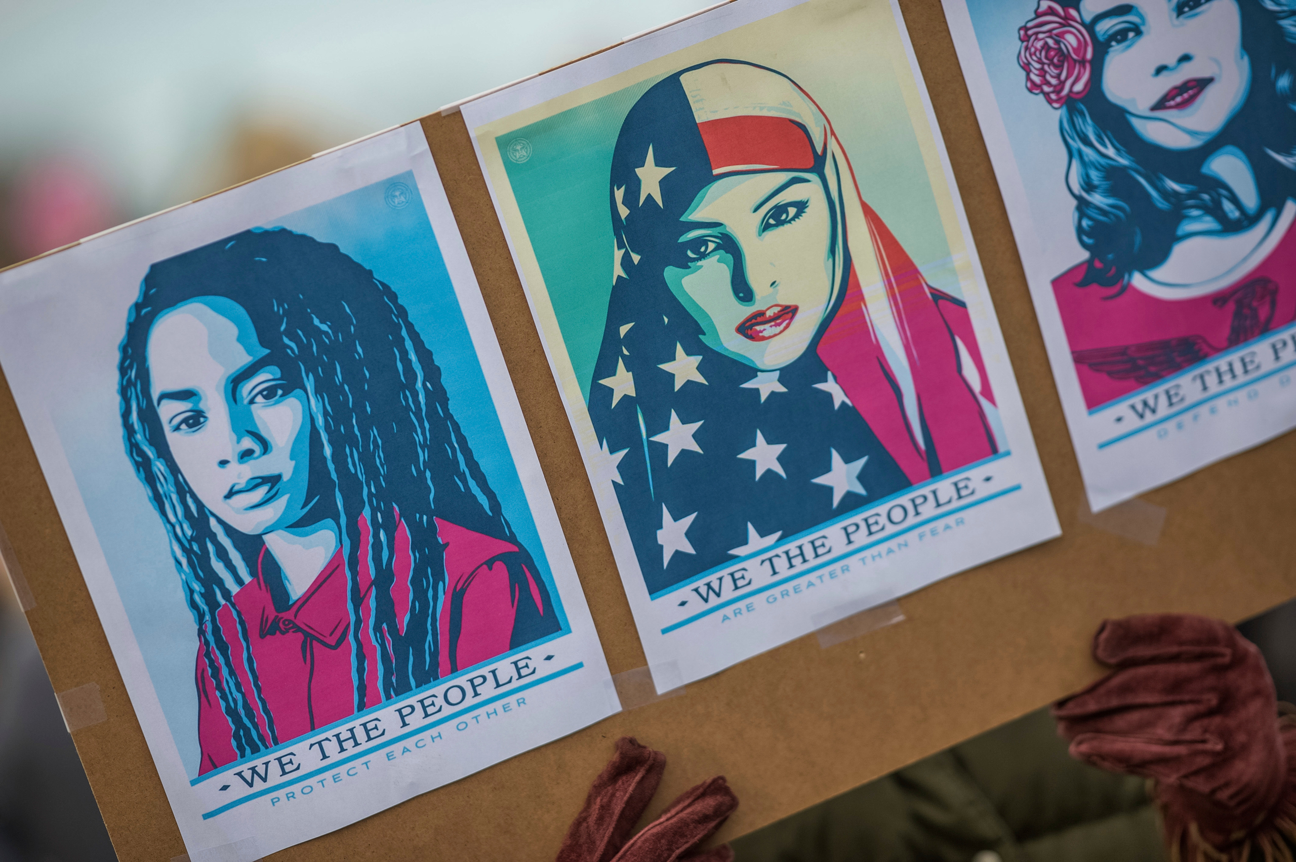 Protesters hold signs in Paris on January 21, 2017 during a women's march in solidarity with women in the US marching against Trump and for women's rights. Following the inauguration of Donald Trump as the 45th president of the United States, the Womens March has spread to be a global march calling on all concerned citizens to stand up for equality, diversity and inclusion and for womens rights to be recognised around the world as human rights. Photo by Khanh Renaud/Sipa USA(Sipa via AP Images)