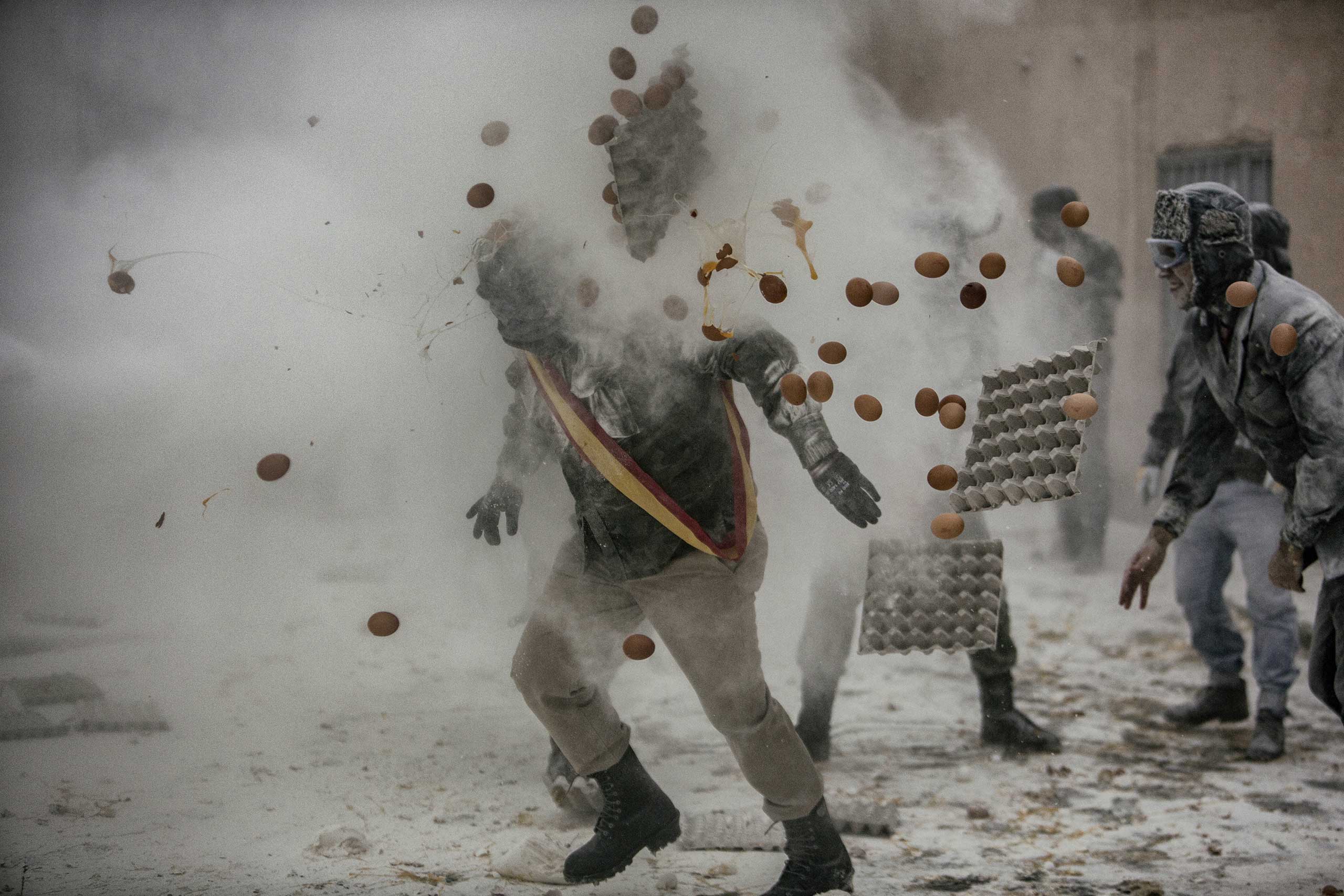 On Dec. 28 each year, the “Floured War  takes place in Ibi in the province of Alicante, Spain. During the festival, the citizens are divided into two groups: the 'Enfarinat' (the floured) group simulates a coup d'etat and a second group tries to calm the rebellion. The teams play with flour, water, eggs and colored smoke bombs.