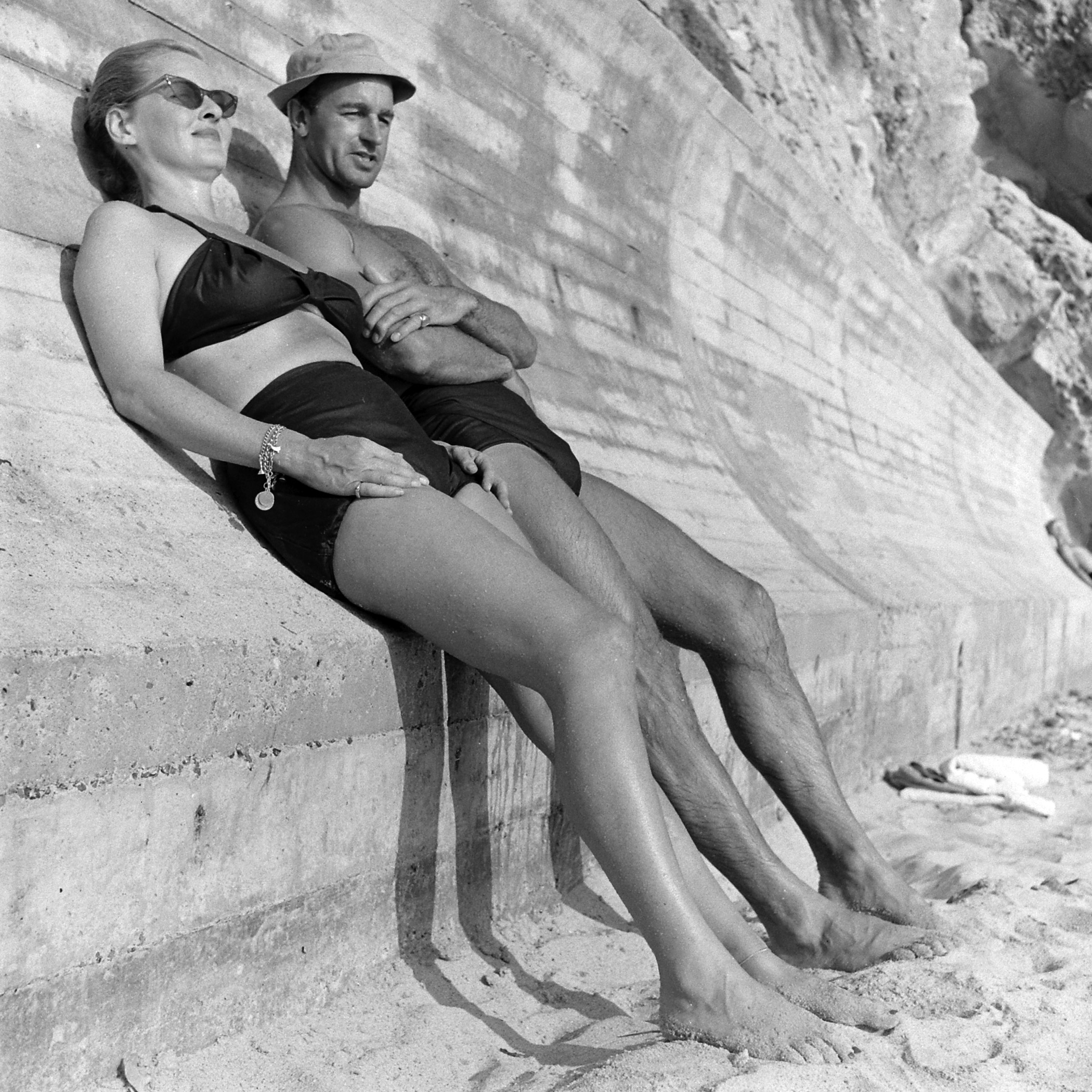 Bette Davis and her third husband William Grant Sherry at the beach in California, 1947.