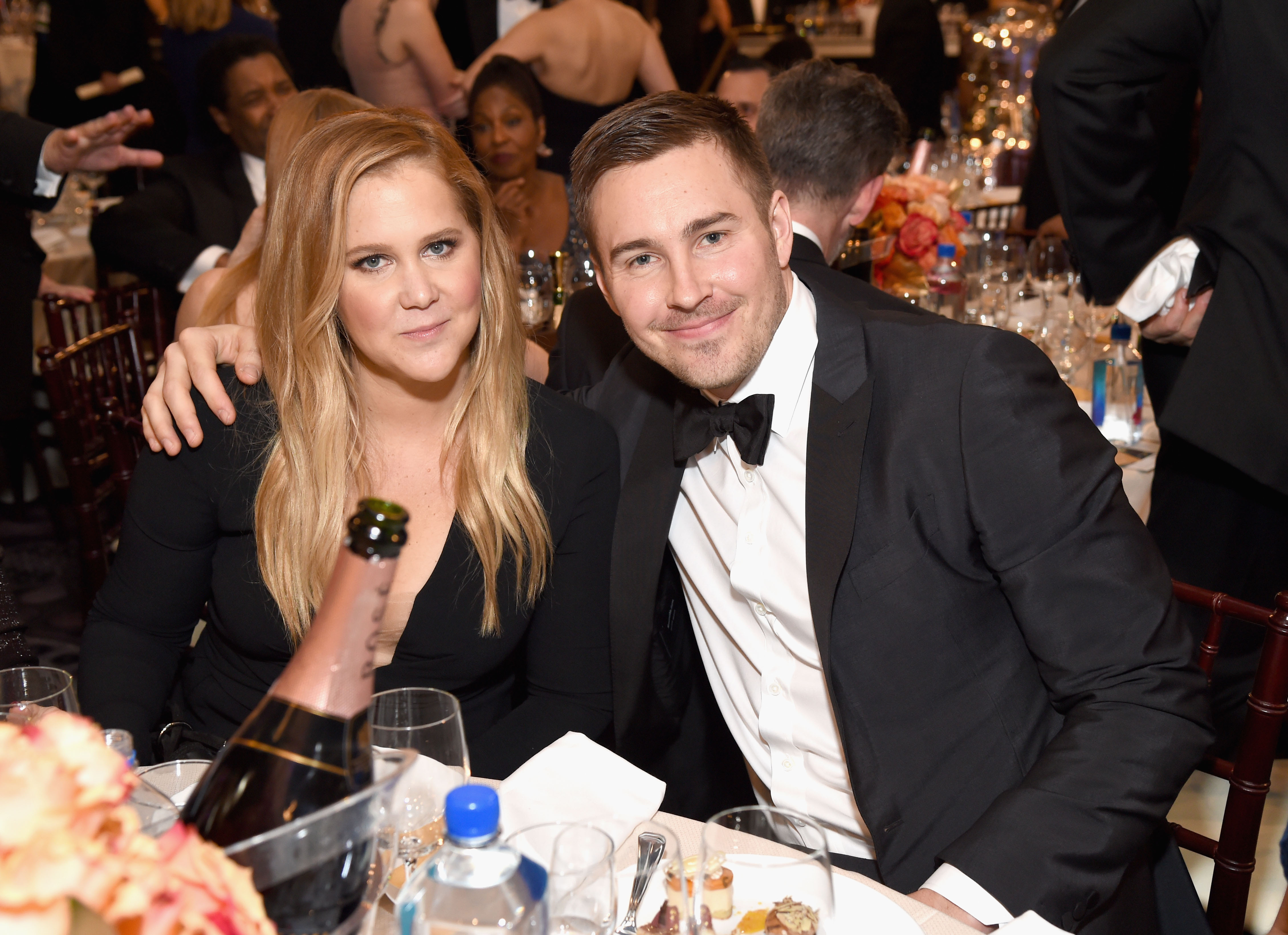 BEVERLY HILLS, CA - JANUARY 08: Actress Amy Schumer (L) and Ben Hanisch attend the 74th Annual Golden Globe Awards at The Beverly Hilton Hotel on January 8, 2017 in Beverly Hills, California.  (Photo by Michael Kovac/Getty Images for Moet &amp; Chandon ) (Michael Kovac—Getty Images for Moet; Chandon)