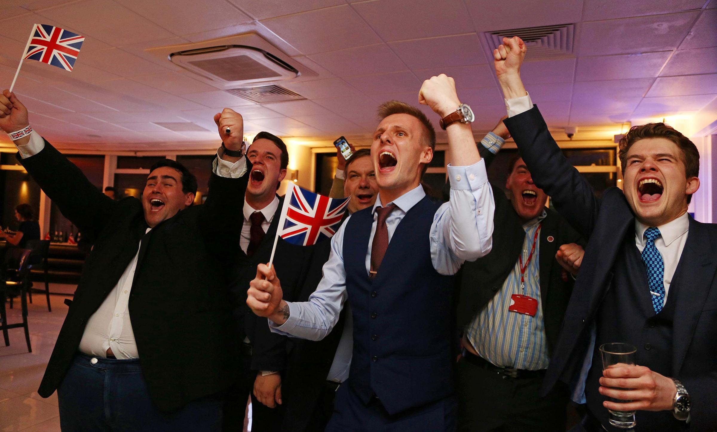 Vote Leave supporters cheer as the results come in at a referendum party at Millbank Tower in central London early on June 24, 2016.