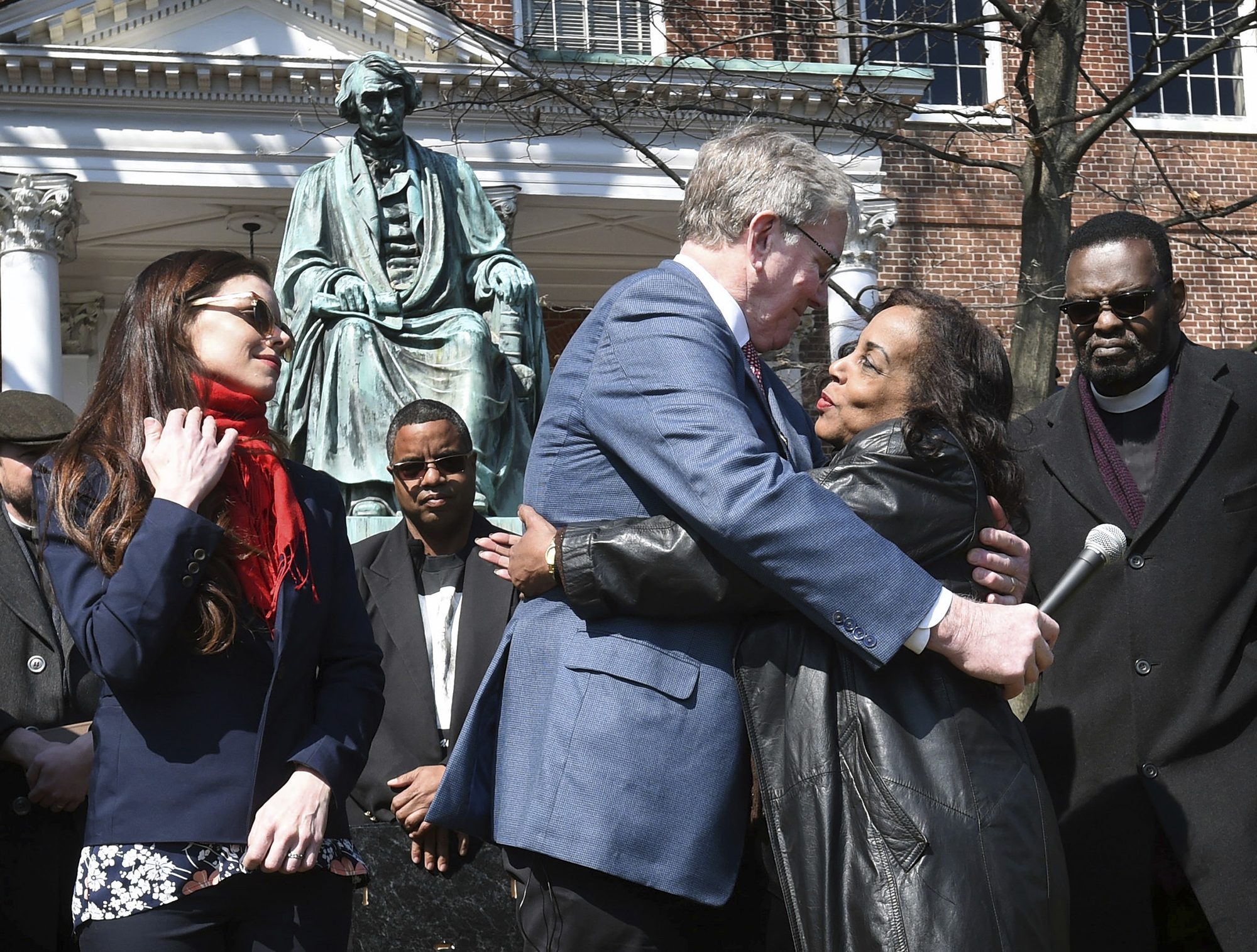 Lynne Jackson, a descendant of Dred Scott, right, hugs Charles Taney III, a descendant of U.S. Supreme Court Chief Justice Roger Taney on the 160th anniversary of the Dred Scott decision in front of the Maryland State House, on March 6, 2017, in Annapolis, Md.