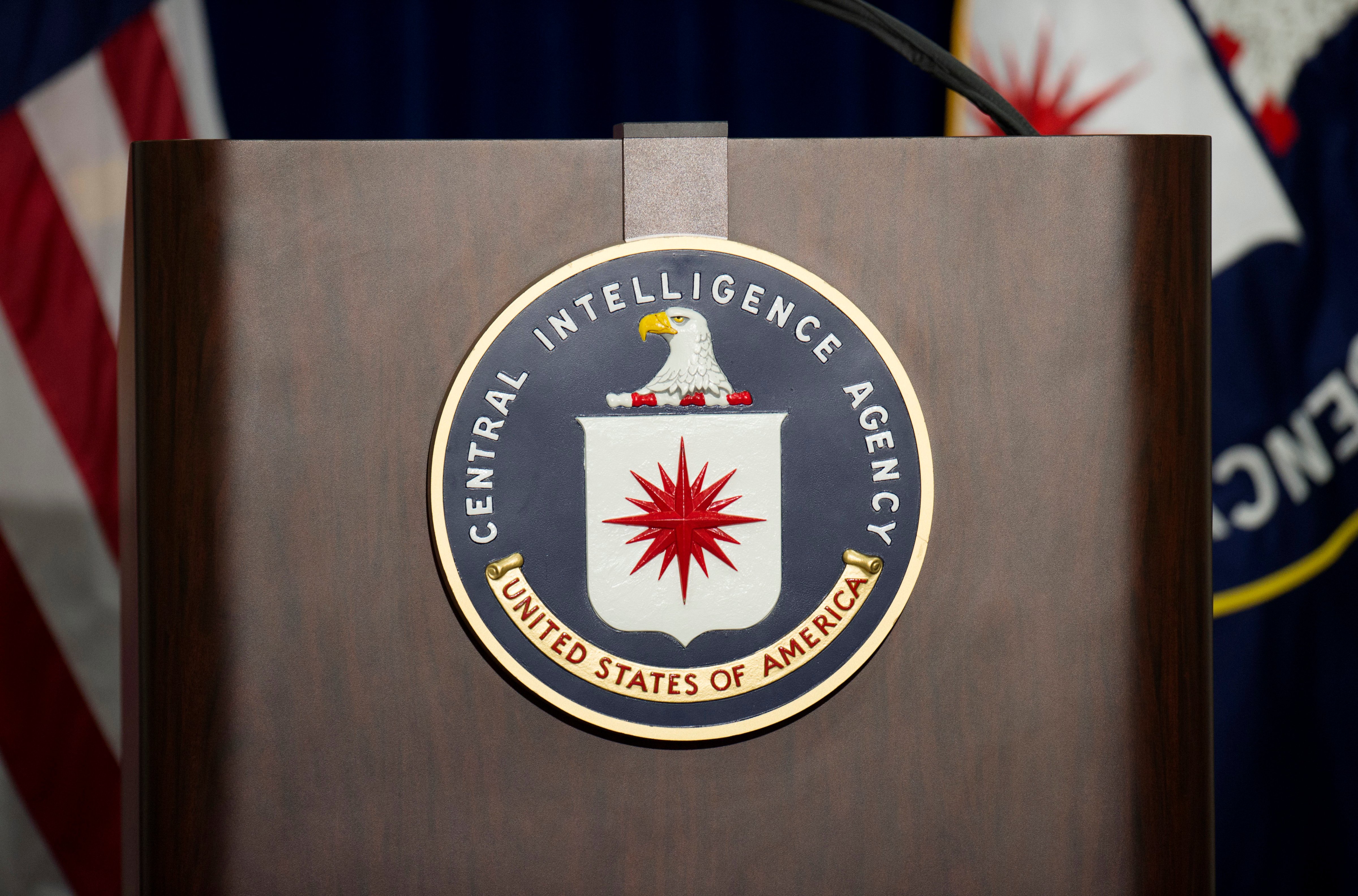 The lectern stands empty as reporters await the arrival of Director of Central Intelligence Agency John Brennan for a press conference at CIA headquarters in Langley, Virginia, December 11, 2014. (Jim Watson—AFP/Getty Images)