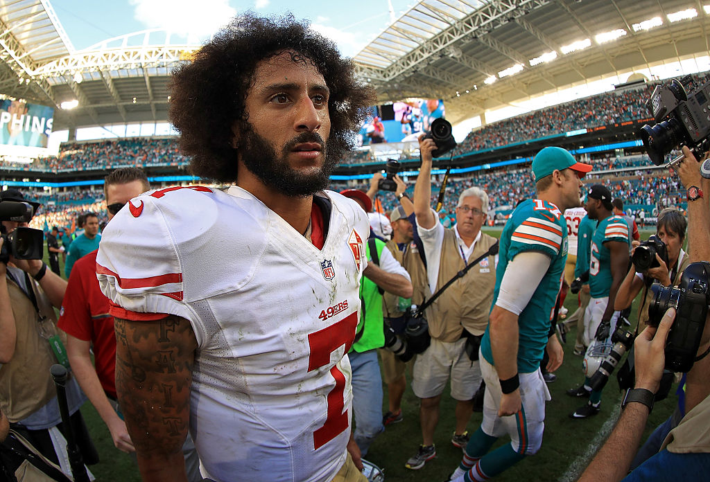Colin Kaepernick #7 of the San Francisco 49ers looks on during a game against the Miami Dolphins on November 27, 2016 in Miami Gardens, Florida. (Mike Ehrmann—Getty Images)