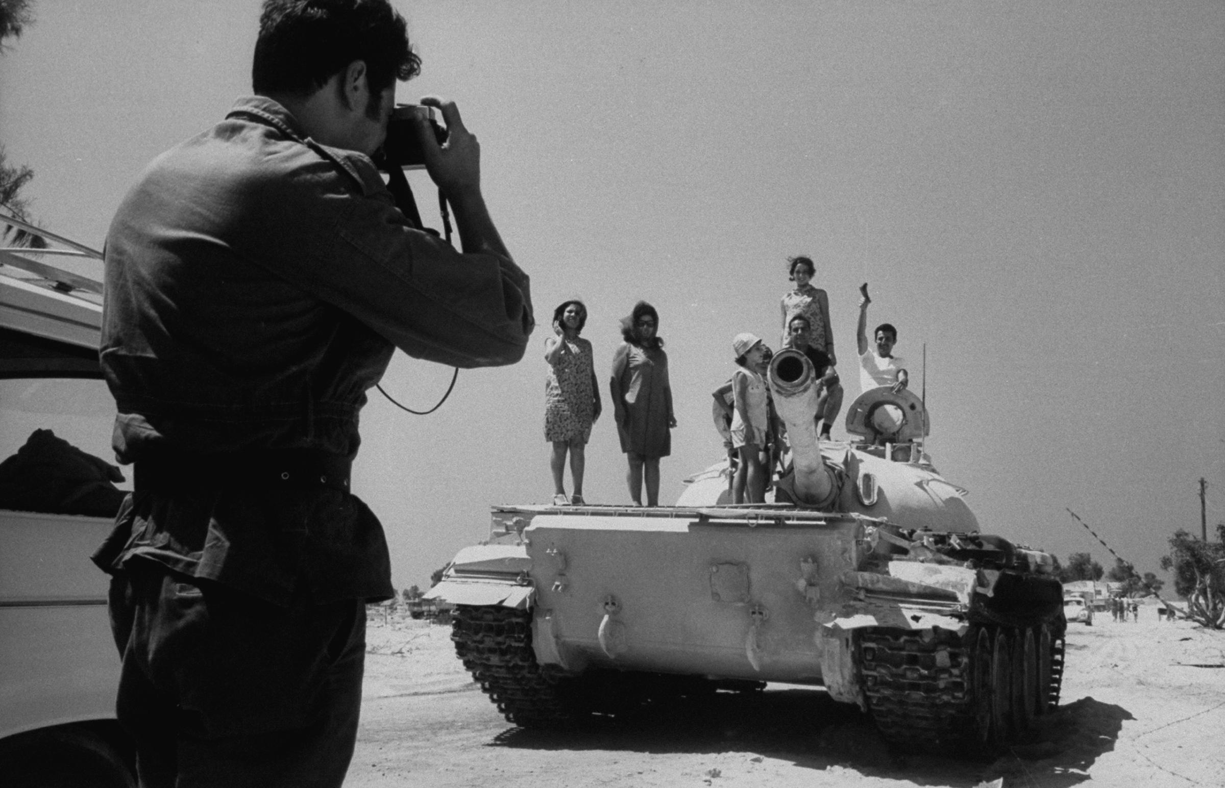Israeli tourists inspecting captured Egyptian weapons, on their visit to Gaza after the war, 1967.