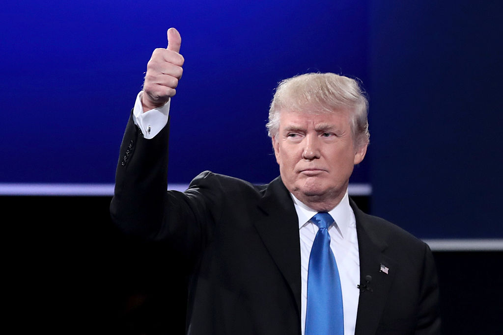 Republican presidential nominee Donald Trump waves after the Presidential Debate with Democratic presidential nominee Hillary Clinton at Hofstra University on September 26, 2016 in Hempstead, New York. (Drew Angerer—Getty Images)
