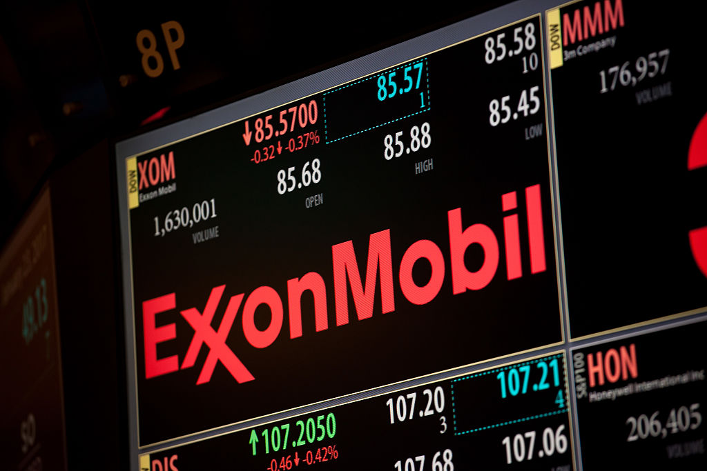 A monitor displays Exxon Mobil Corp. signage on the floor of the New York Stock Exchange (NYSE) in New York, U.S., on Monday, Jan. 23, 2017. (Bloomberg—Bloomberg via Getty Images)