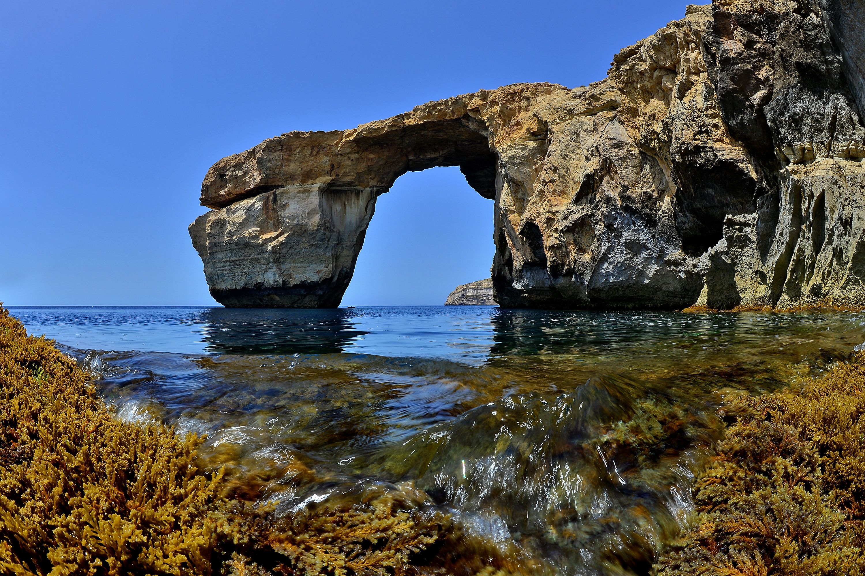 DWEJRA, GOZO - MAY 20:  The natural arch 'The Azure Window' is seen at Dwejra Bay on May 20, 2014 in Dwejra/Gozo, Malta. (Sascha Steinbach — Getty Images)