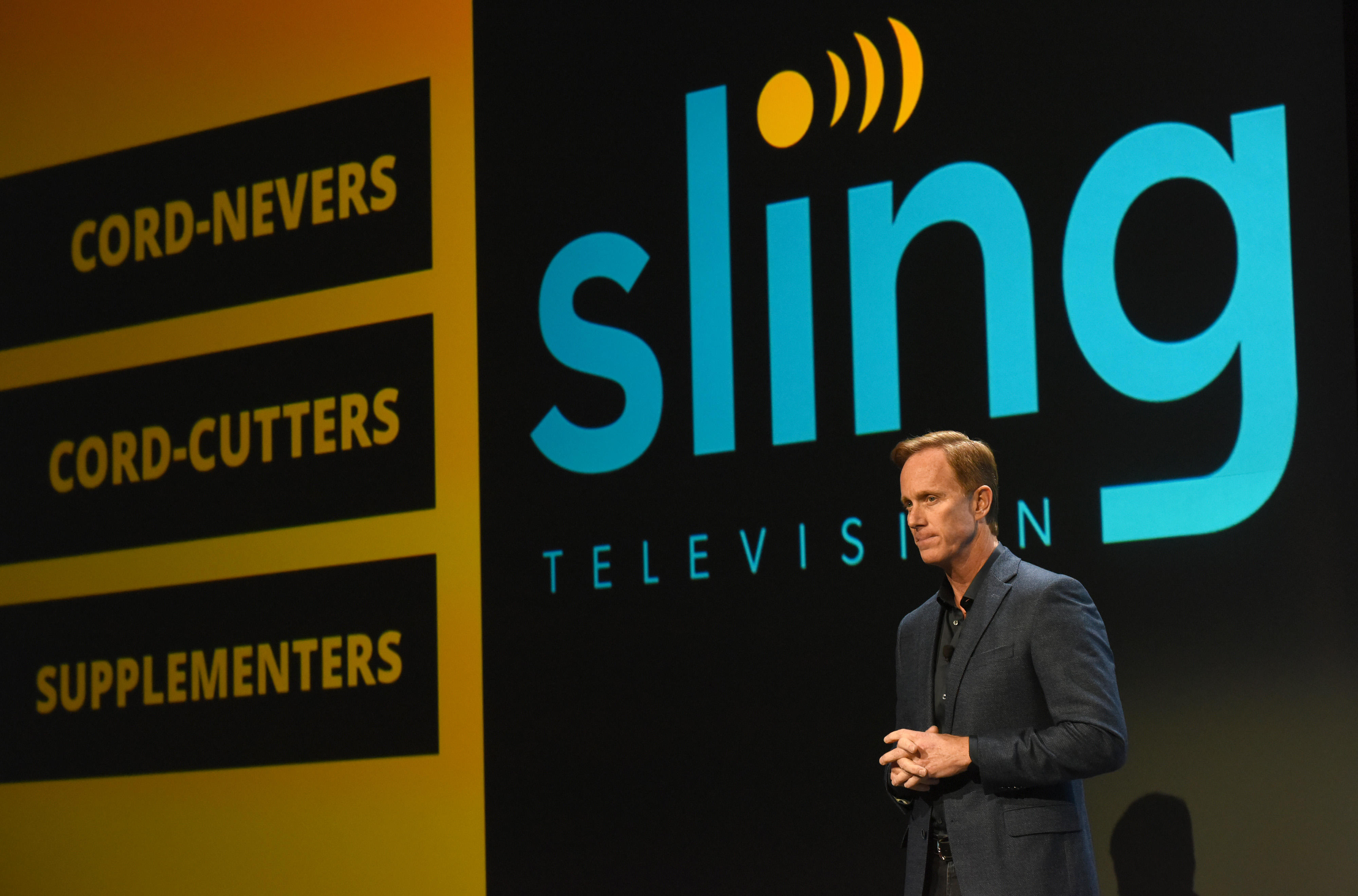 Roger Lynch, chief executive officer of Sling TV LLC, pauses while speaking during an event at the 2016 Consumer Electronics Show (CES) in Las Vegas, Nevada, U.S., on Tuesday, Jan. 5, 2016. (Bloomberg—Bloomberg via Getty Images)