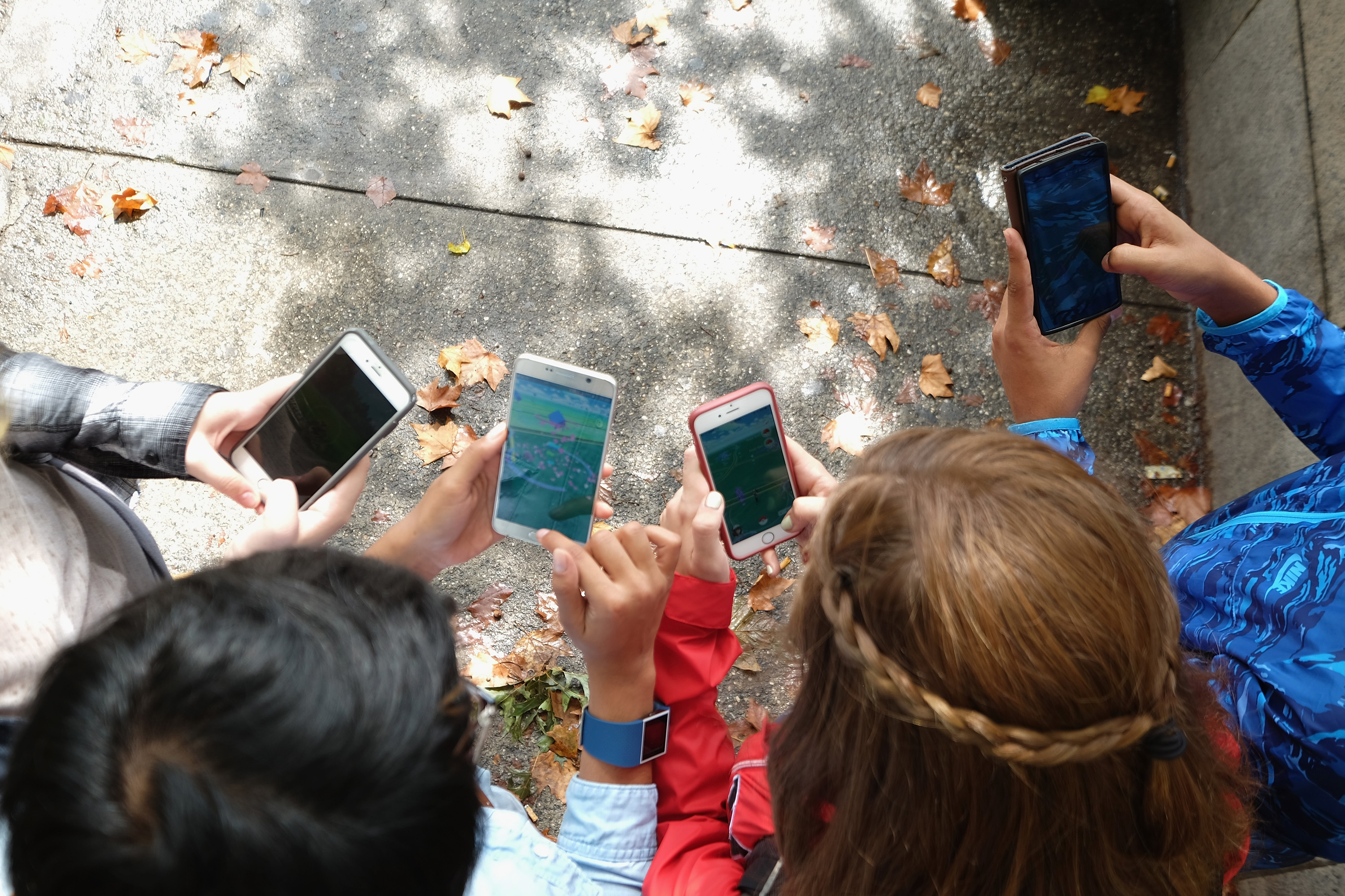 Children play Pokemon Go in Central Park as Pokemon Go craze hits New York City on July 29, 2016 in New York City. (Michael Loccisano&mdash;Getty Images)
