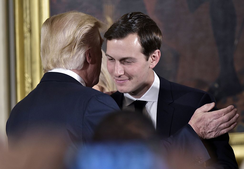 President Trump congratulates his son-in-law and senior advisor Jared Kushner in the White House on Jan. 22, 2017 in Washington, DC. (Mandel Ngan—AFP—Getty Images)