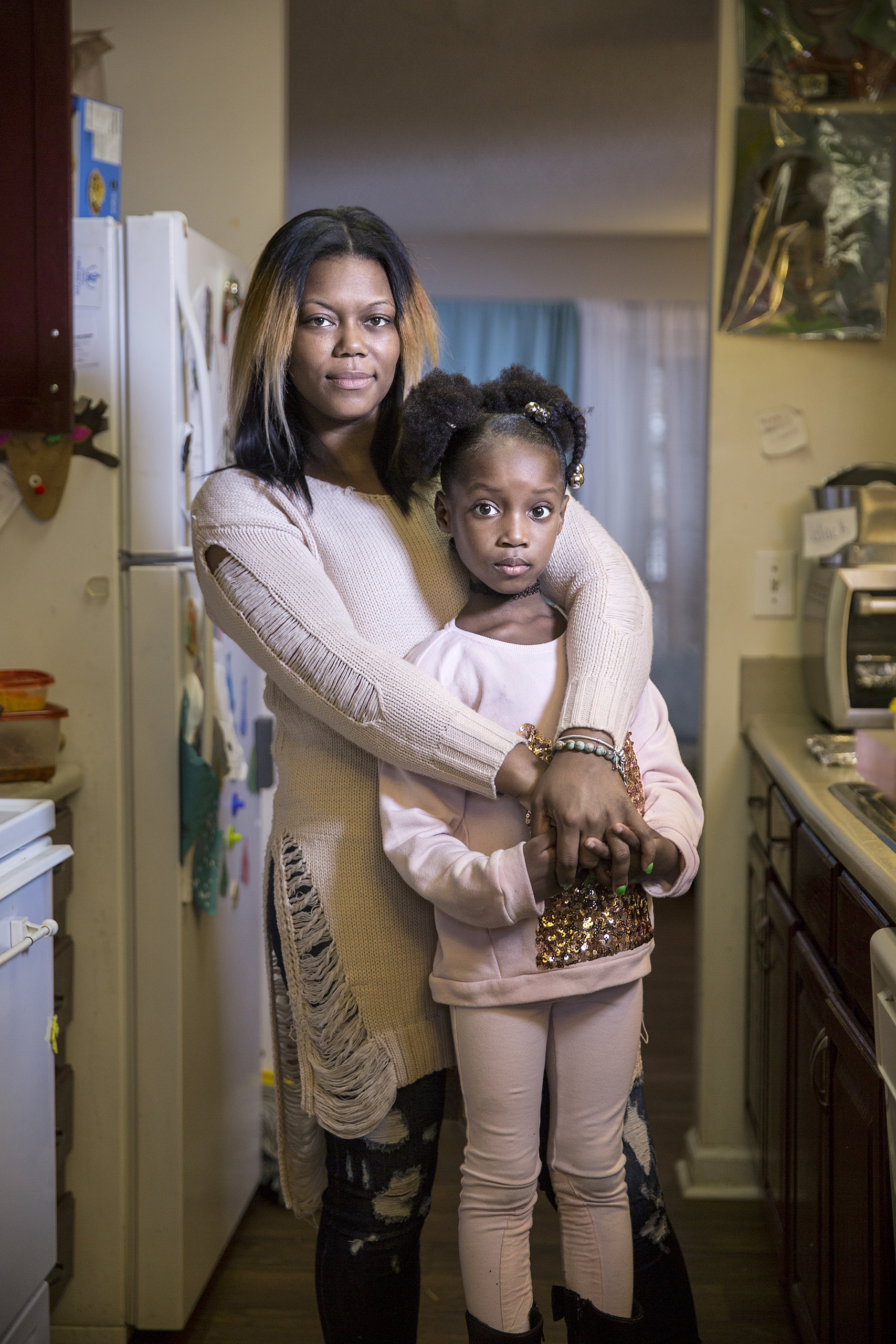 Masonia Traylor, with daughter Marissa, 5: “I did everything I needed to do to make sure she got here HIV-negative. She needs to do what she has to do to stay that way.” (Fernando Decillis for TIME)