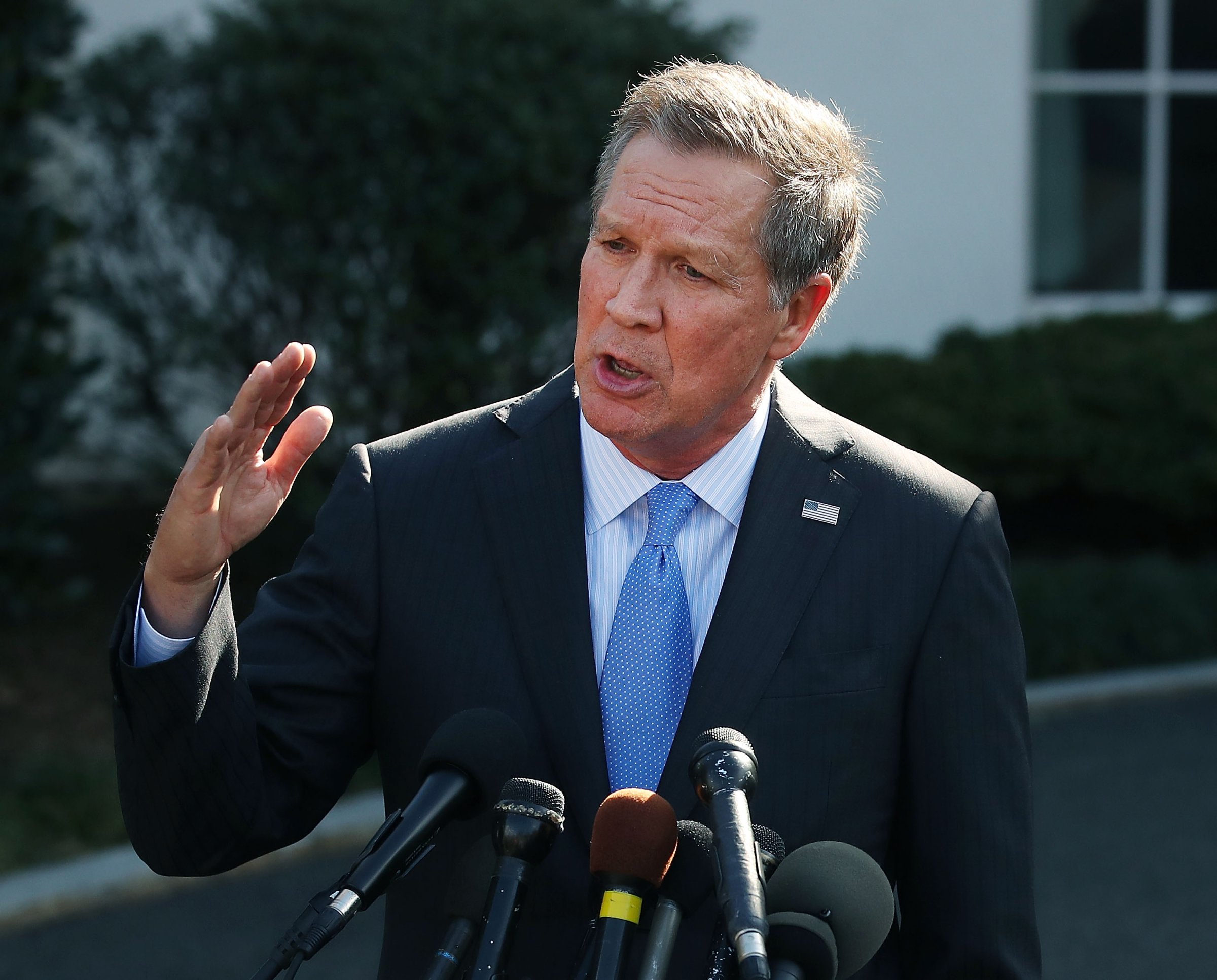 Ohio Governor John Kasich speaks to reporters after a closed meeting with U.S. President Donald Trump, on Feb. 24, 2017 in Washington, D.C.