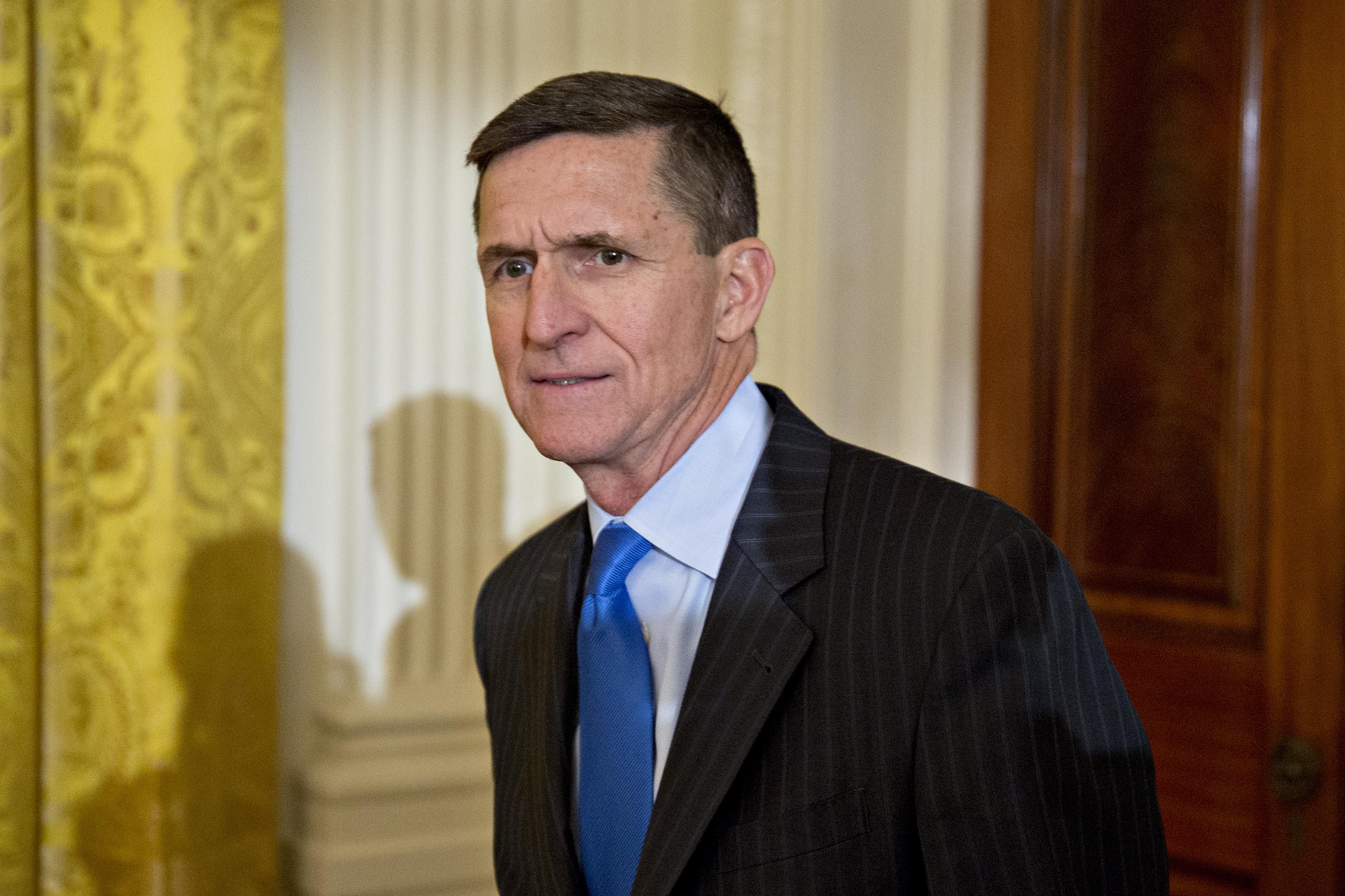 Retired Lieutenant General Michael Flynn arrives to a swearing in ceremony of White House senior staff in the East Room of the White House in Washington, D.C., U.S., on Sunday, Jan. 22, 2017. (Andrew Harrer—Bloomberg via Getty Images)