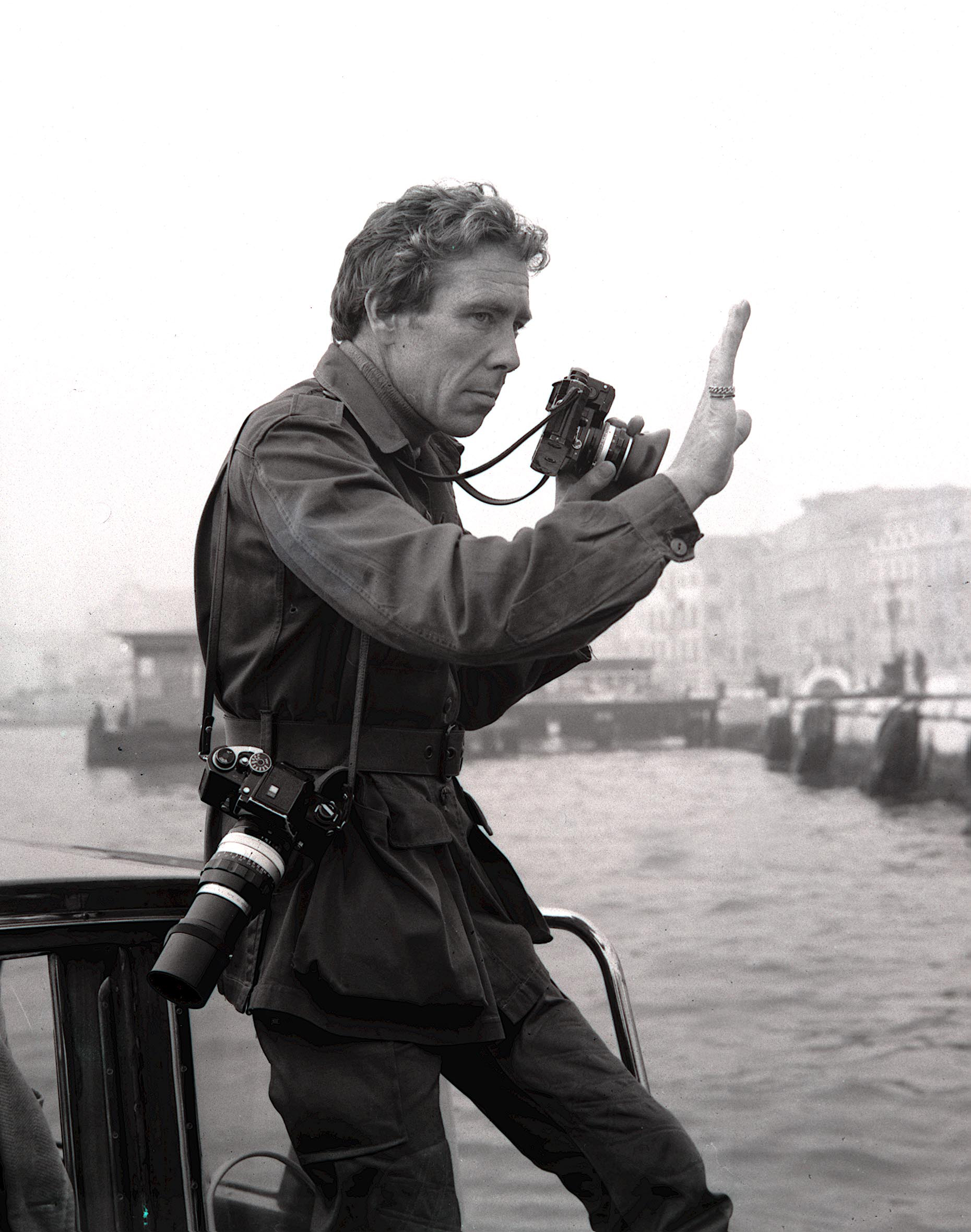 Photographer Lord Snowdon, husband of Princess Margaret, pictured at work in Venice, Italy on Oct. 14, 1971.