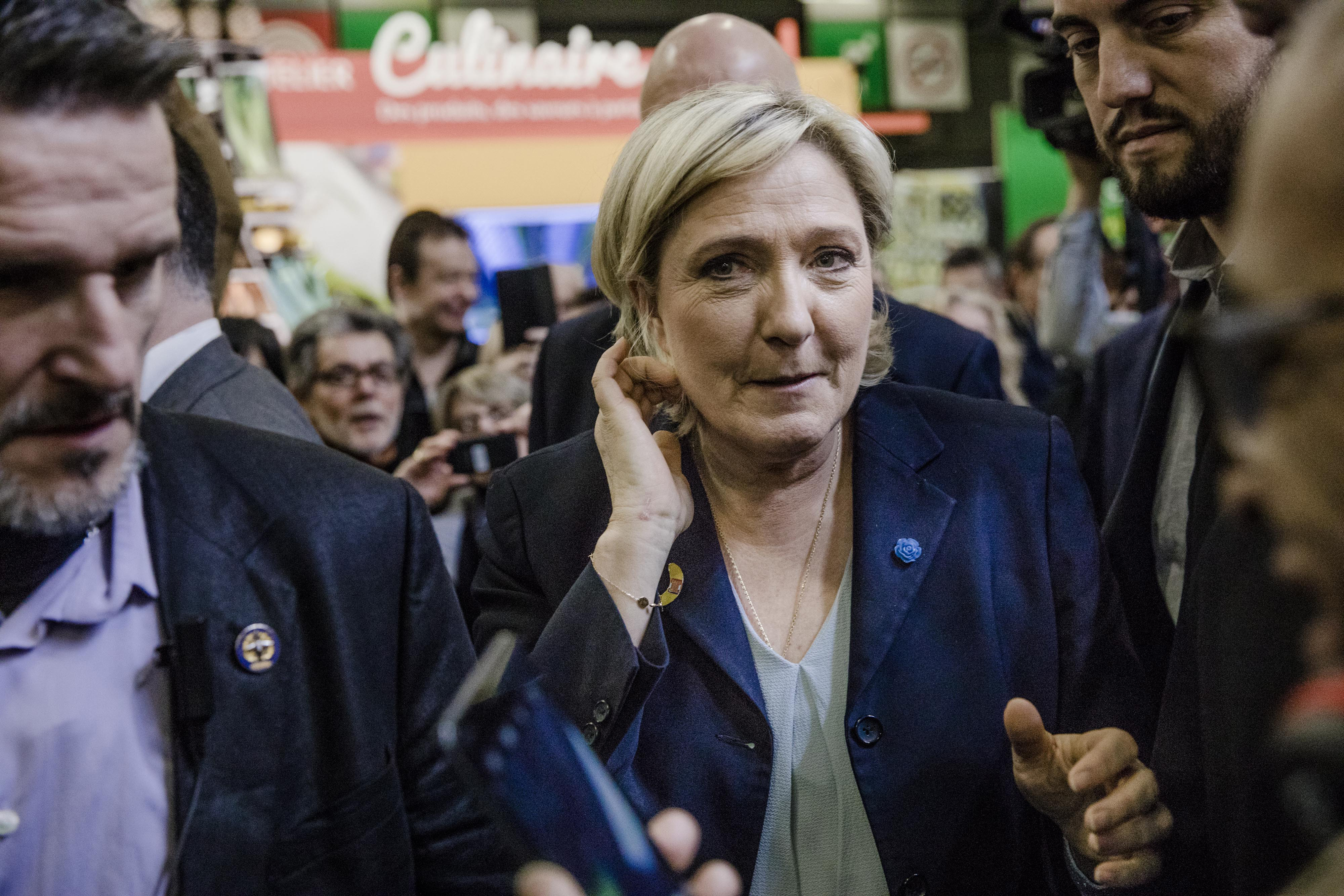 Marine Le Pen, France's presidential candidate and leader of the French National Front, tours the Paris International Agriculture Fair in Paris, France, on Tuesday, Feb. 28, 2017. Earlier last week, Le Pen refused a non-binding summons to be interviewed by French police over use of European Parliament funds to pay for party work in France. (Marlene Awaad/Bloomberg via Getty Images)