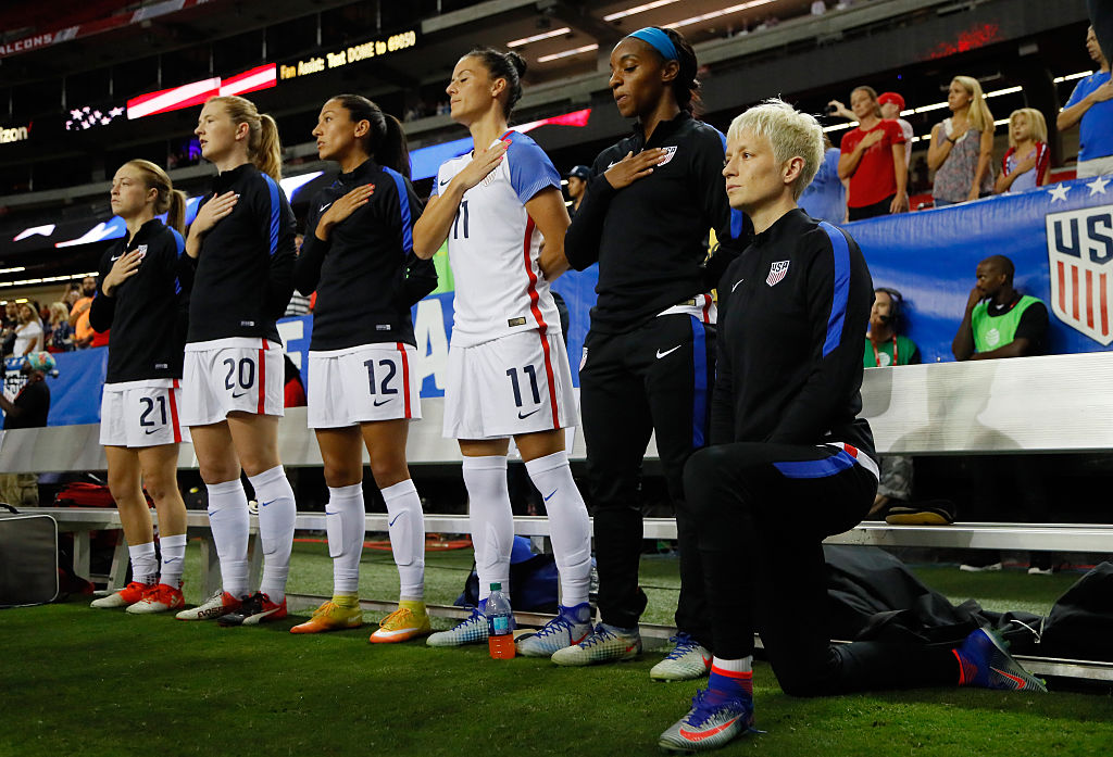 Megan Rapinoe #15 kneels during the National Anthem prior to the match between the United States and the Netherlands at Georgia Dome on September 18, 2016 in Atlanta, Georgia. (Kevin C. Cox—Getty Images)
