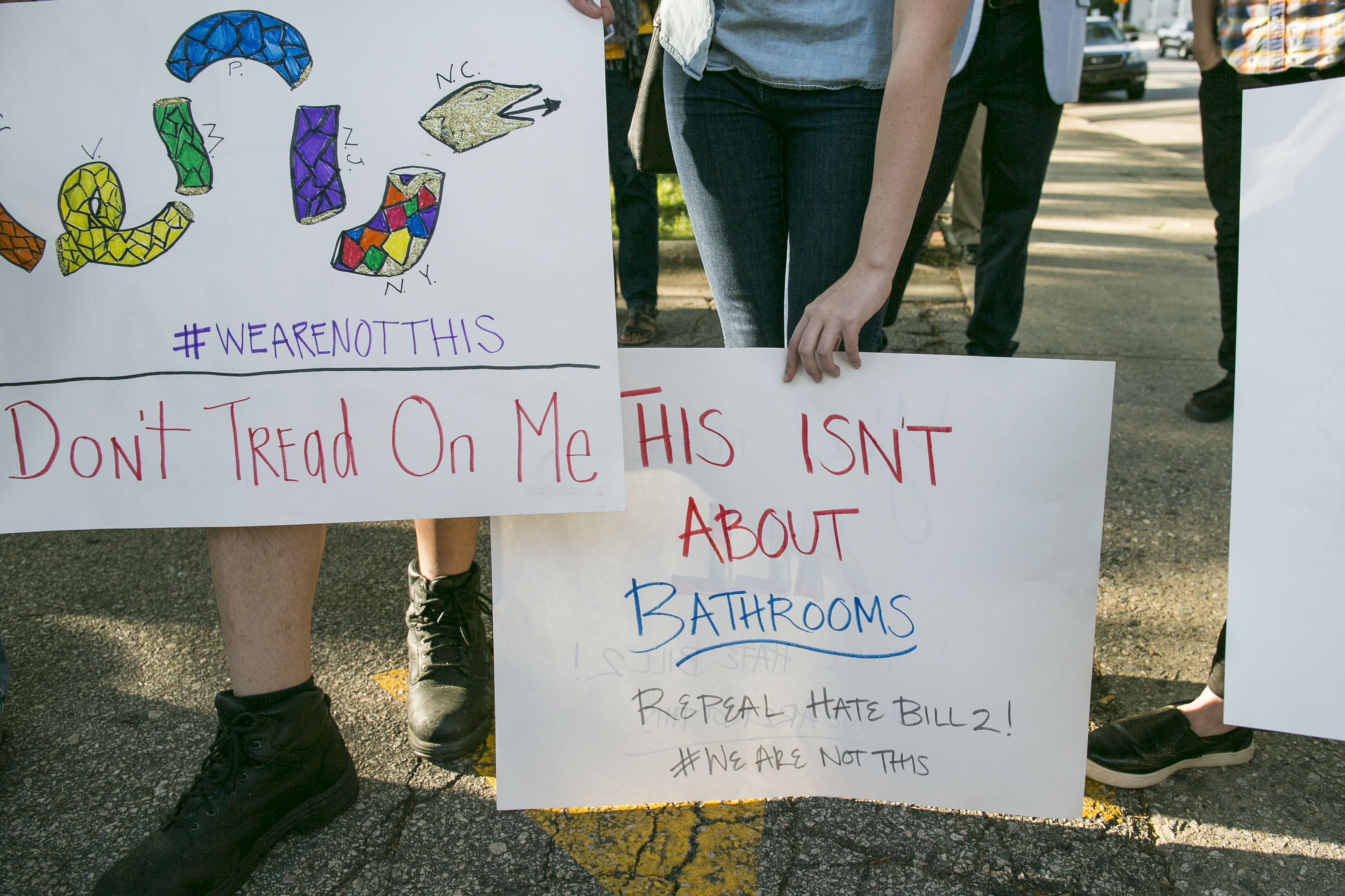 Protestors gather across the street from the North Carolina state legislative building to express disapproval over the controversial "Bathroom Bill," or  House Bill 2, in Raleigh, N.C., on Monday, May 16, 2016. (Al Drago—CQ-Roll Call,Inc.)