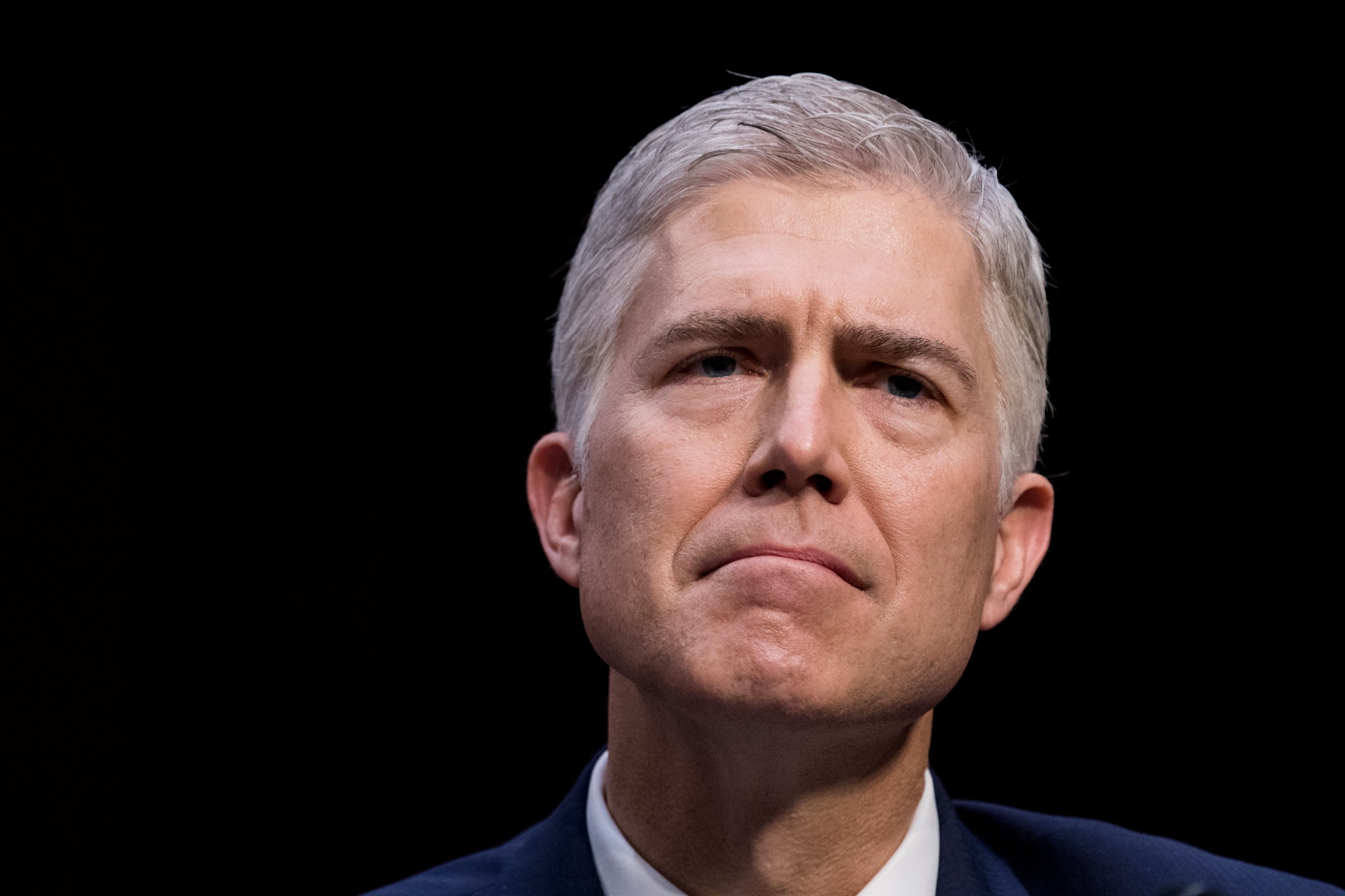 Neil Gorsuch, nominee to be Associate Justice of the U.S. Supreme Court, listens to Senators' opening statements during the first day of the Senate Judiciary Committee confirmation hearings on Monday, March 20, 2017.