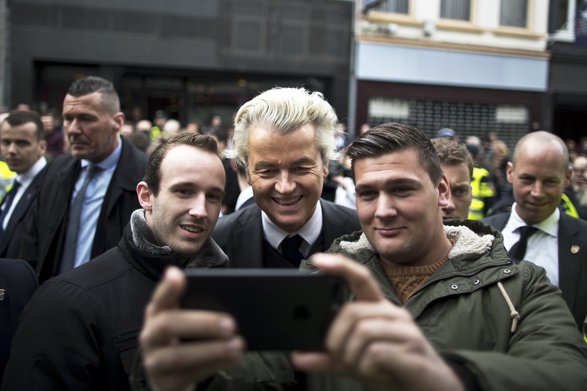 Firebrand anti-Islam lawmaker Geert Wilders, poses for a selfie with supporters during a campaign stop in Heerlen, Netherlands, on March 11, 2017. (Muhammed Muheisen—AP)