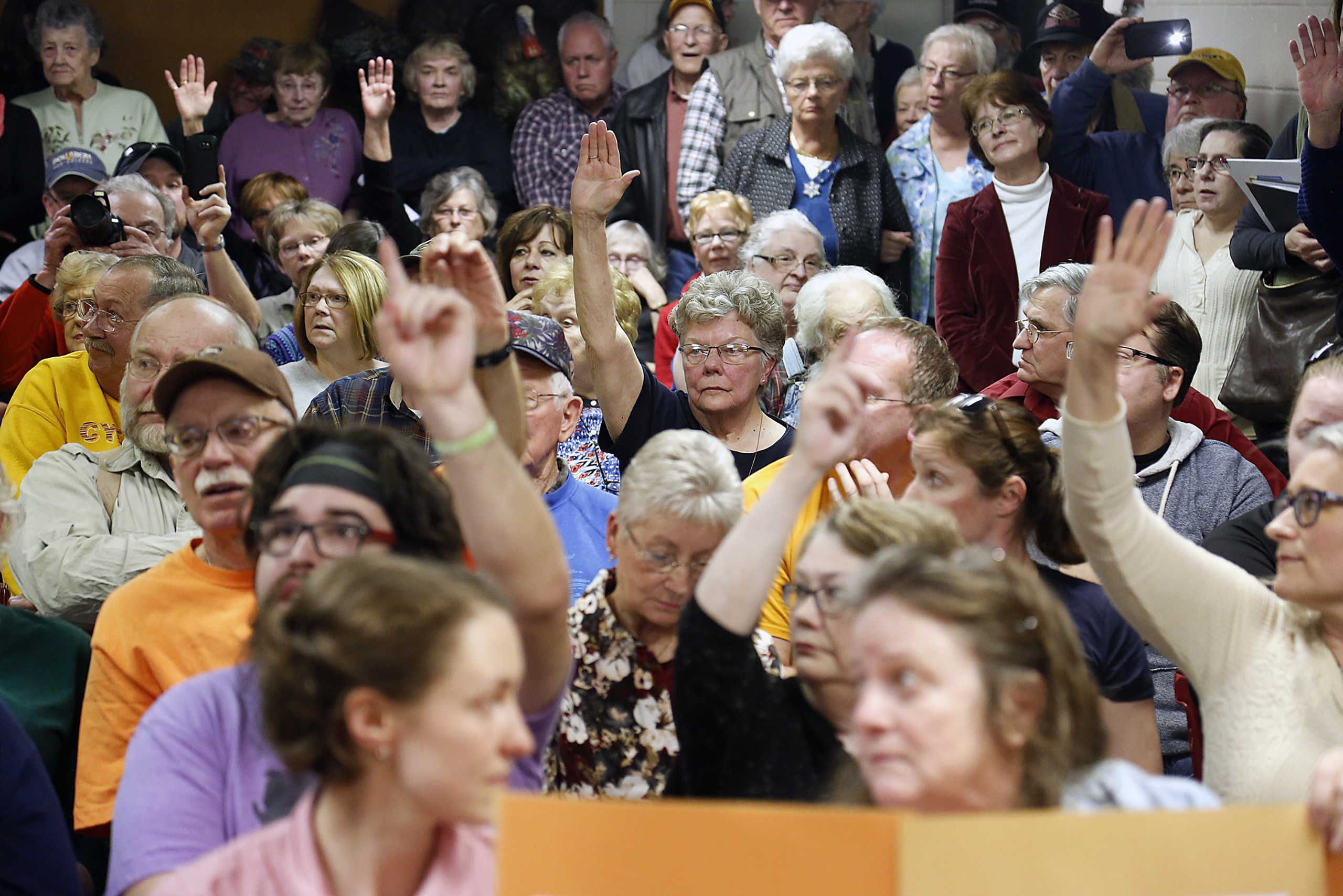 At town halls across the country, including this one for Senator Chuck Grassley in Garner, Iowa, on Feb. 21, voters have raised concerns about losing benefits under plans to repeal and replace Obamacare. (The Washington Post—Getty Images)