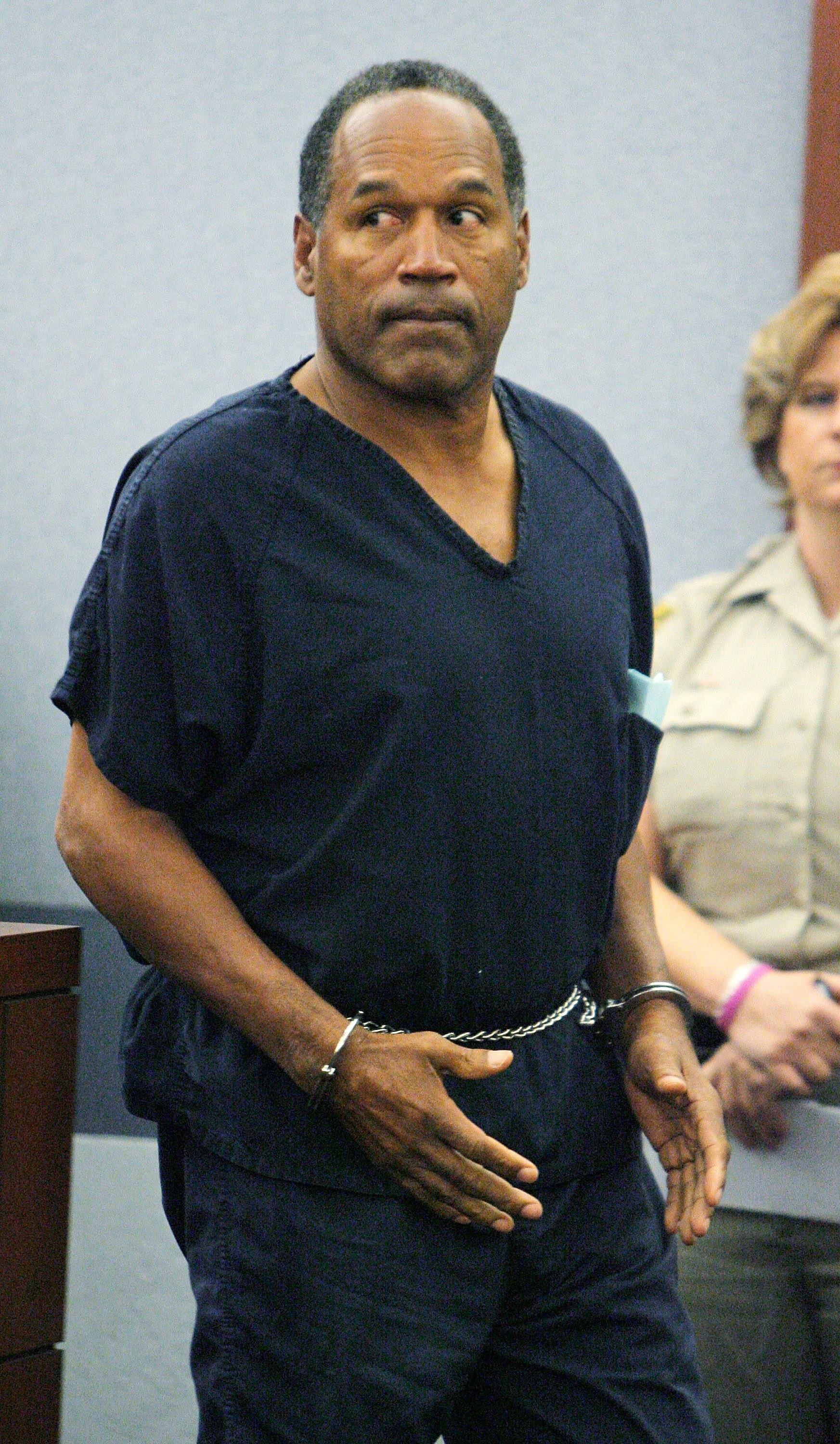 O.J. Simpson enters a Las Vegas courtroom to be arraigned on charges including kidnapping, assault and burglary at the Clark County Regional Justice Center September 19, 2007. (Pool&mdash;Getty Images)