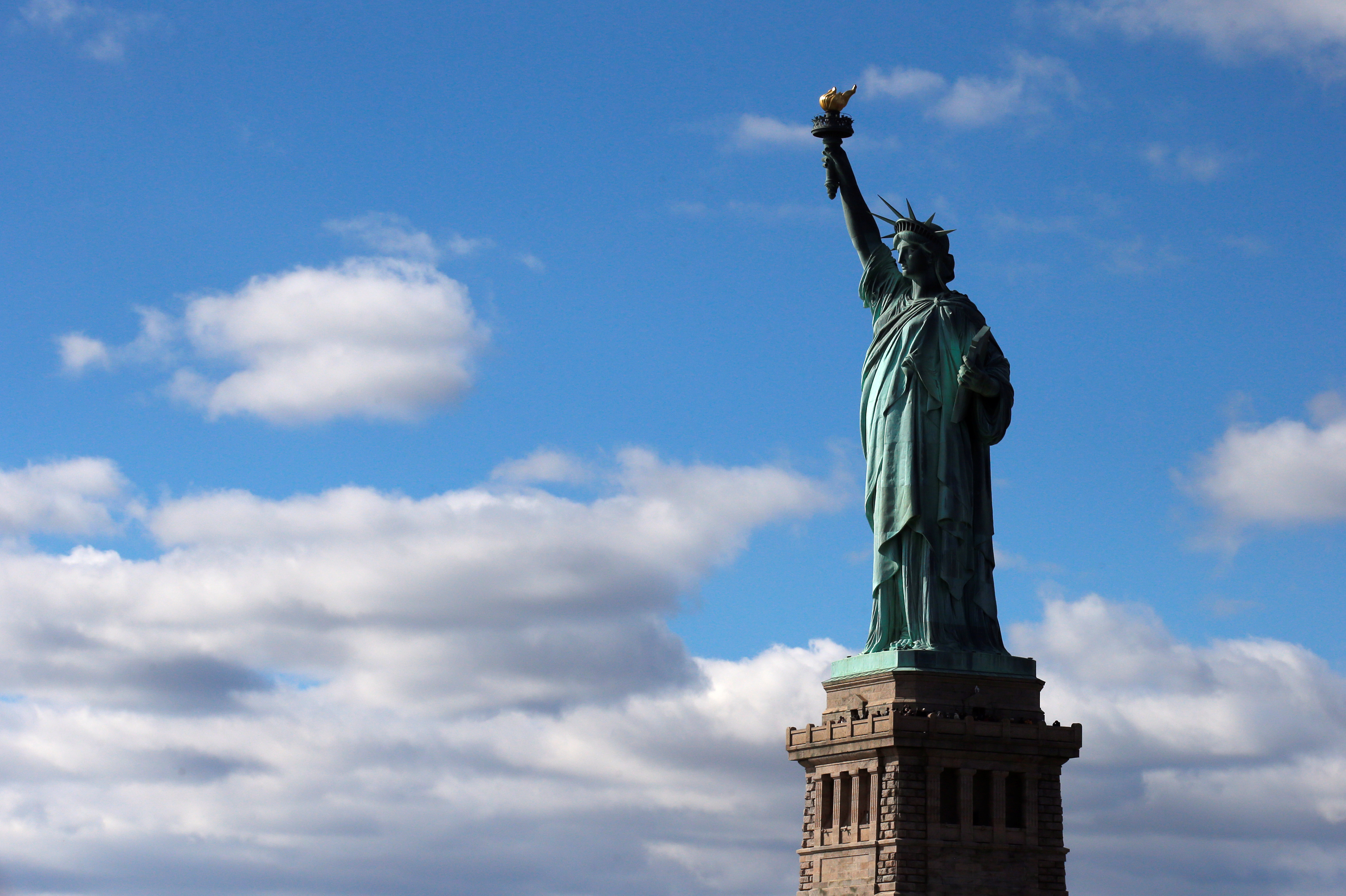 The Statue of Liberty is seen on the 130th anniversary of the dedication in New York Harbor