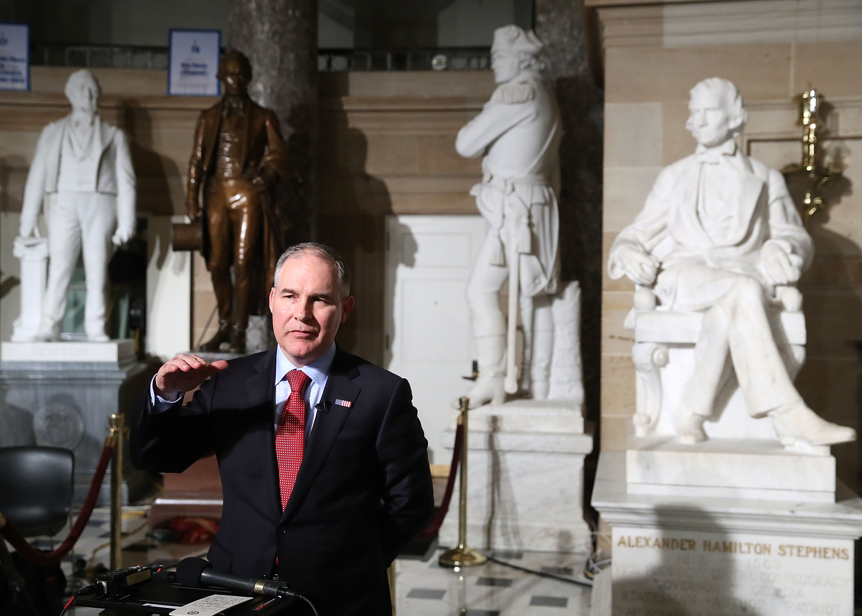 EPA Administrator Scott Pruitt does a television interview in Statuary Hall at the U.S. Capitol before President Donald Trump delivers a speech to a joint session of Congress on February 28, 2017 in Washington, D.C. (Mark Wilson—Getty Images)
