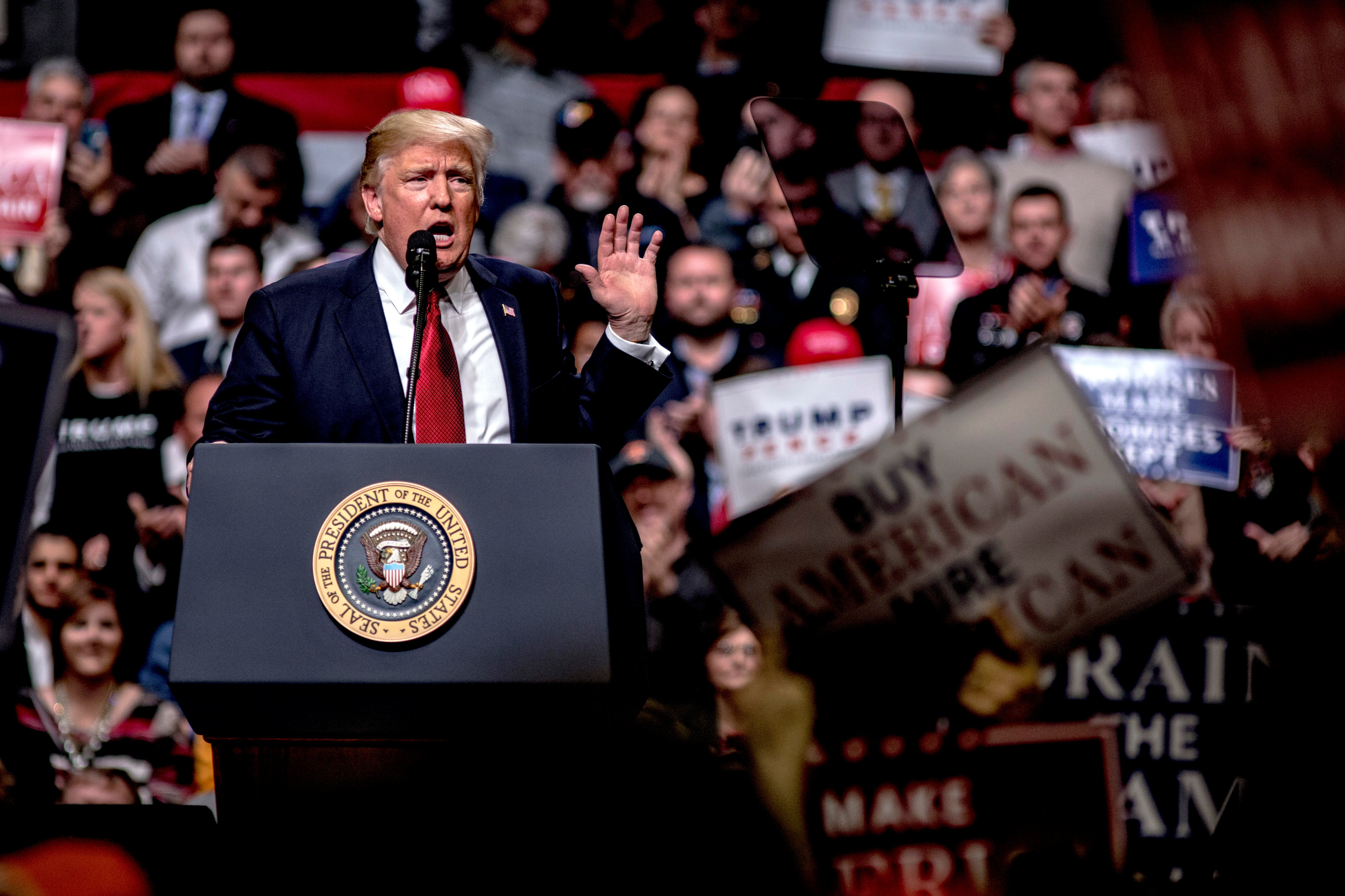 President Donald Trump speaks at a rally on March 15, 2017 in Nashville, Tennessee. During his speech Trump promised to repeal and replace Obamacare and also criticized the decision by a federal judge in Hawaii that halted the latest version of the travel ban. (Andrea Morales—Getty Images)